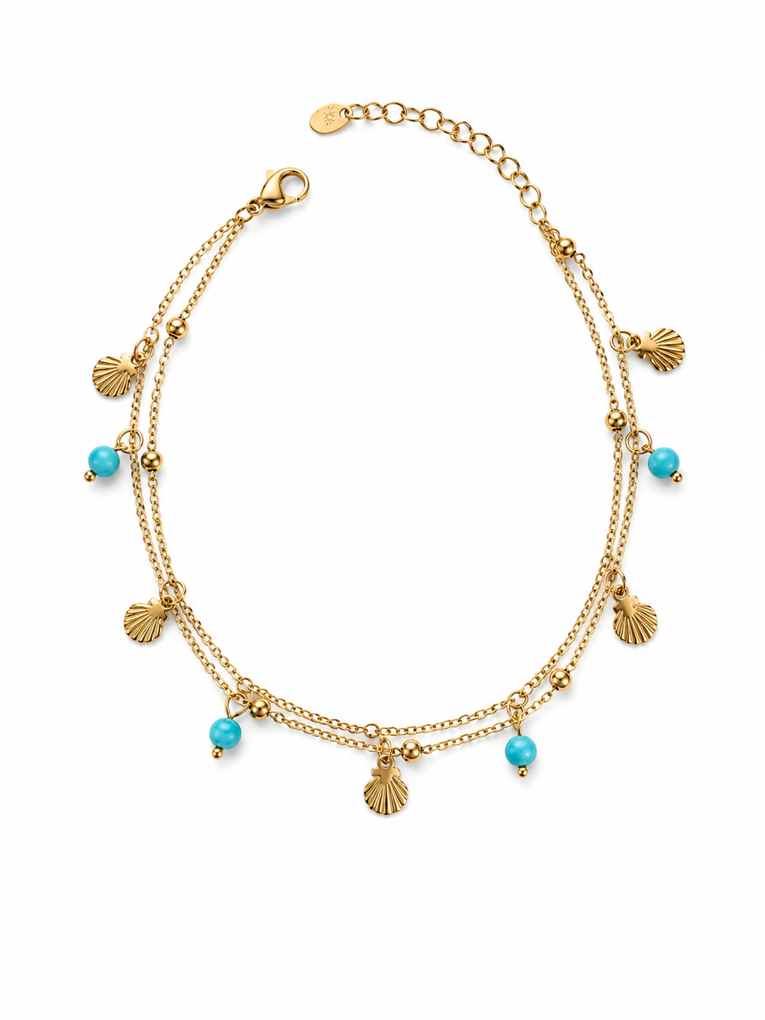 Chaîne de cheville Oceane avec coquillages dorés et perles turquoise sur fond blanc - Tokade