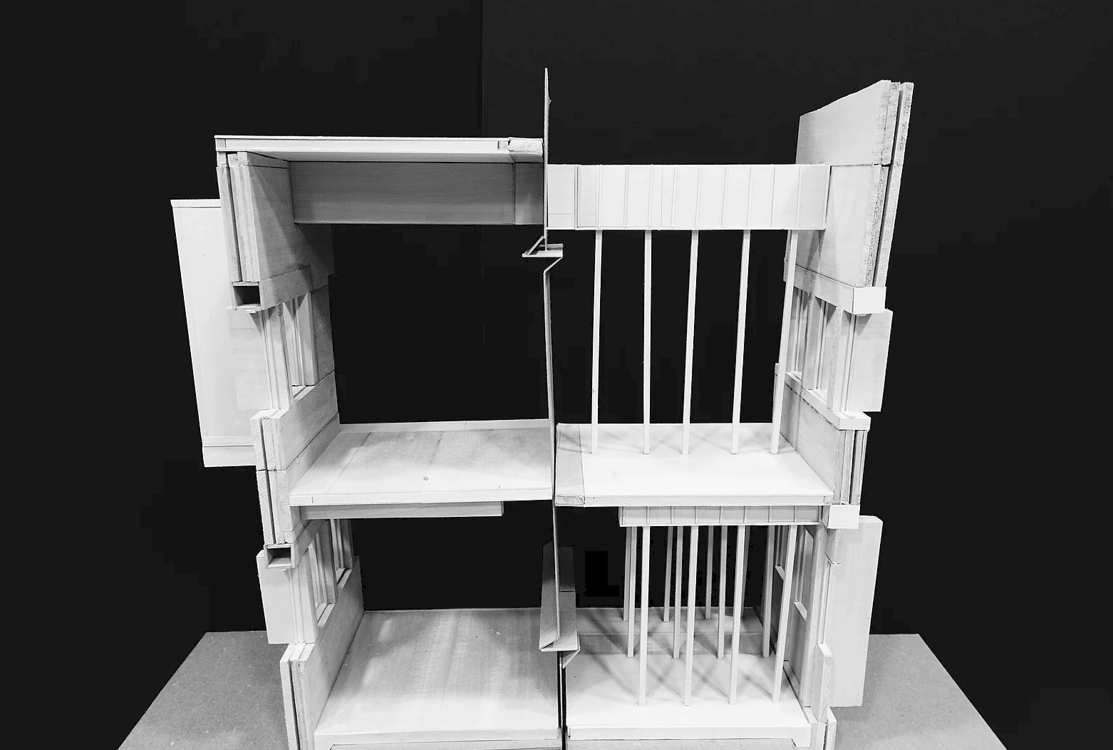 Physical Model recreation of a wall section showing beams on two way floor slab systems. The left side of the image represents the final product while the right side represents the shoring needed for the site cast concrete. Do models like this that represent the concepts we go over in class help me visualize the concepts that are in play.