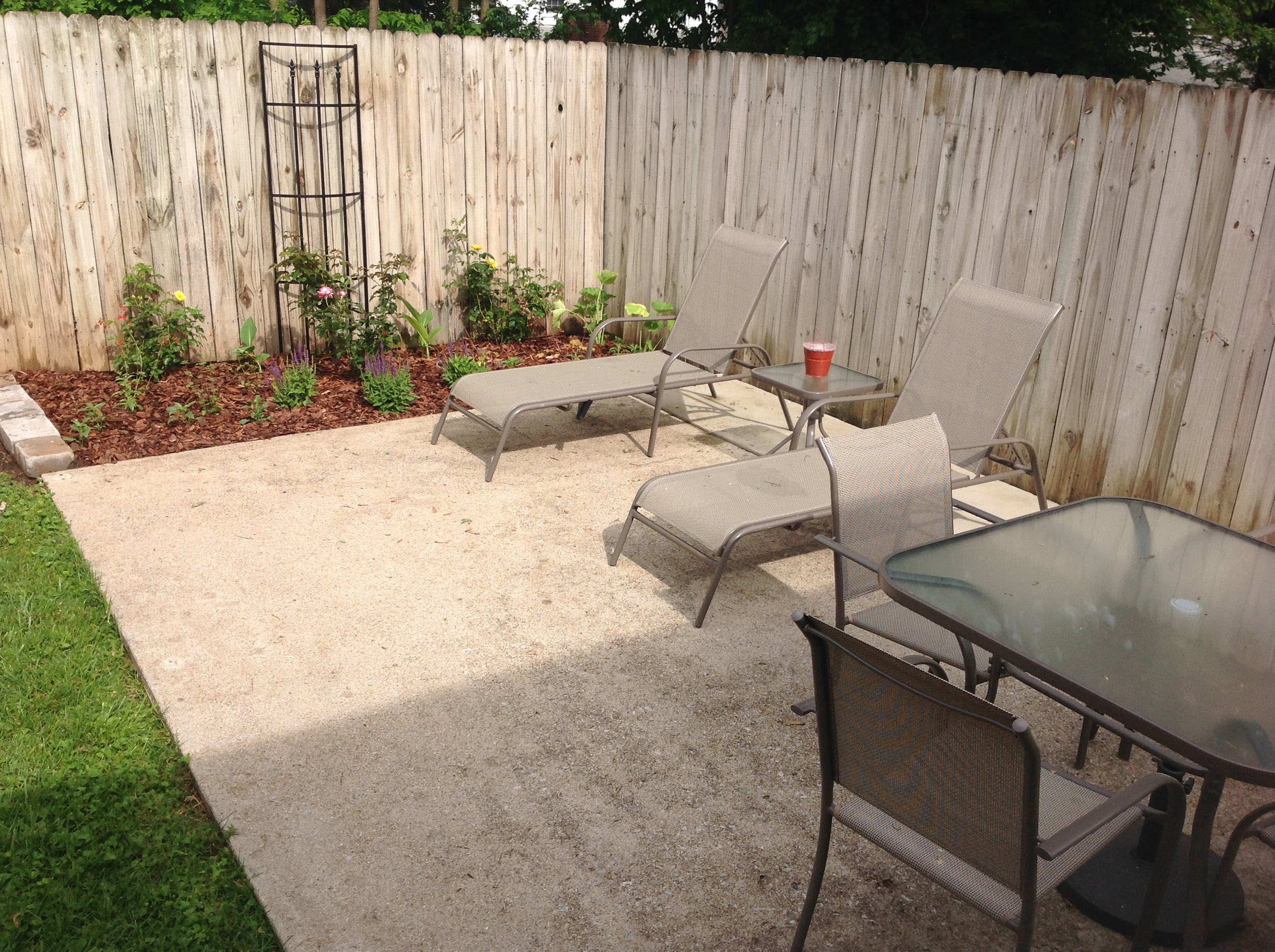 Enjpy the private patio with a grill, hammock, and outdoor dining.