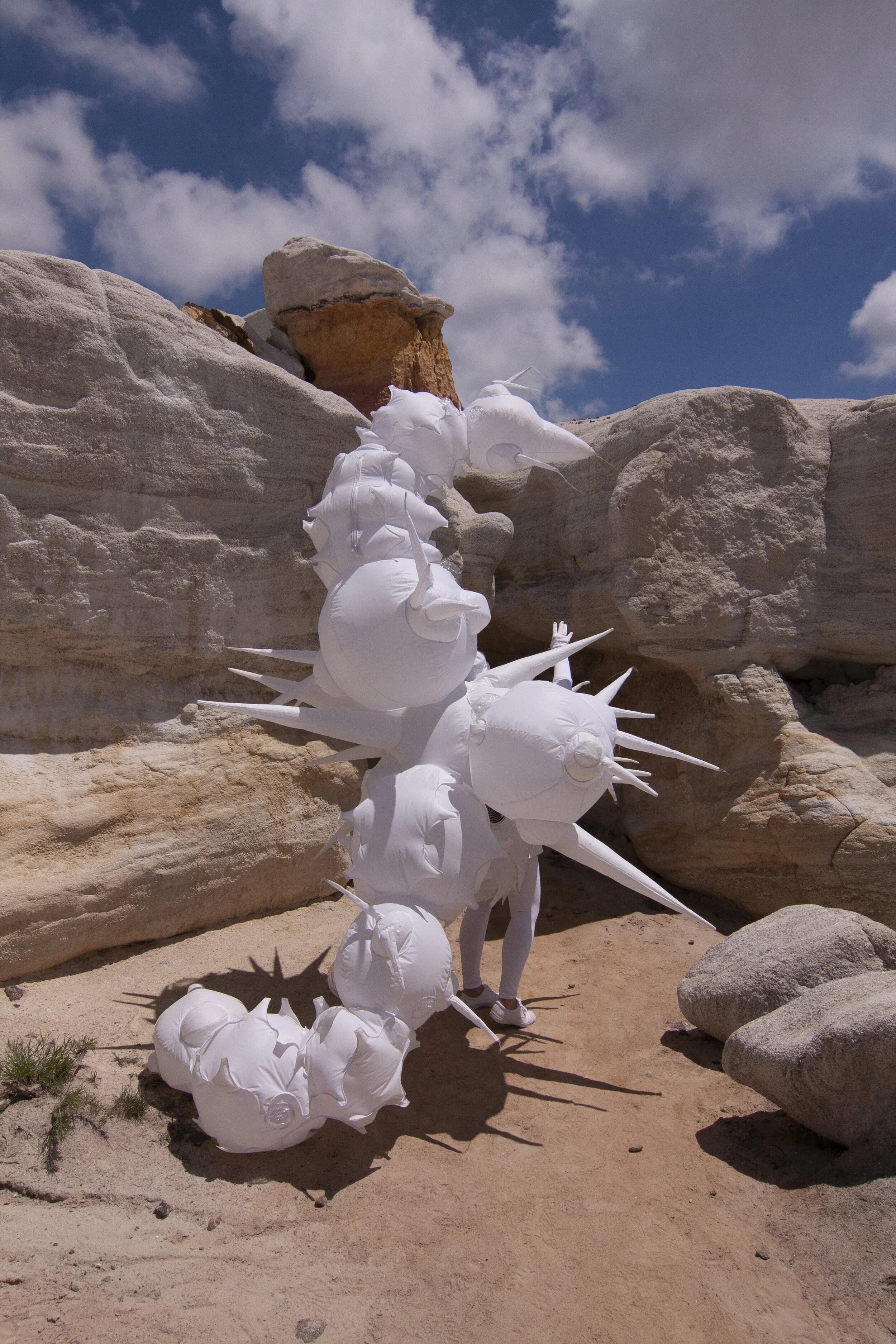 Inflatable fabric sculpture creature performance in Paint Mines