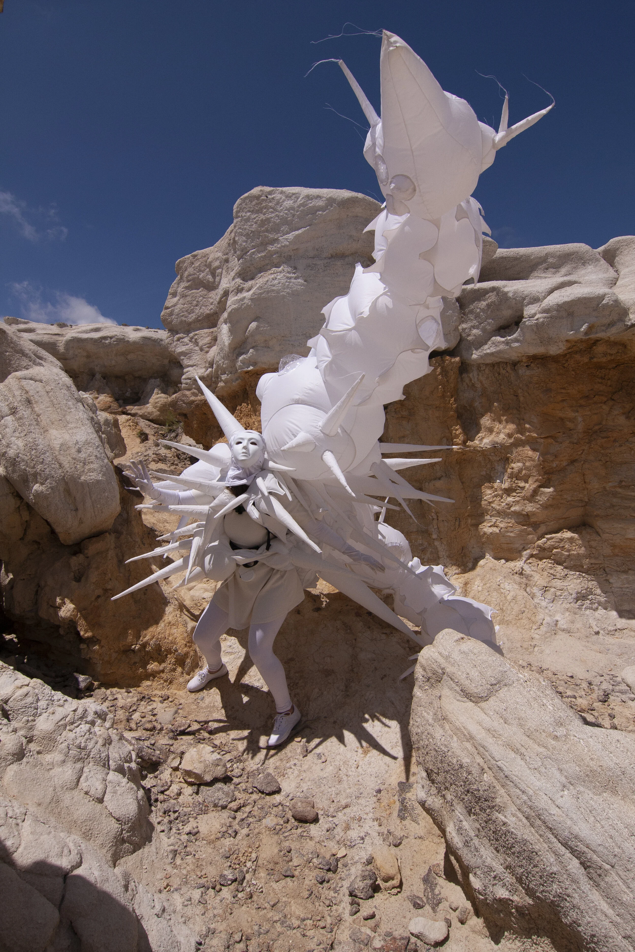 Inflatable fabric sculpture creature performance in Paint Mines