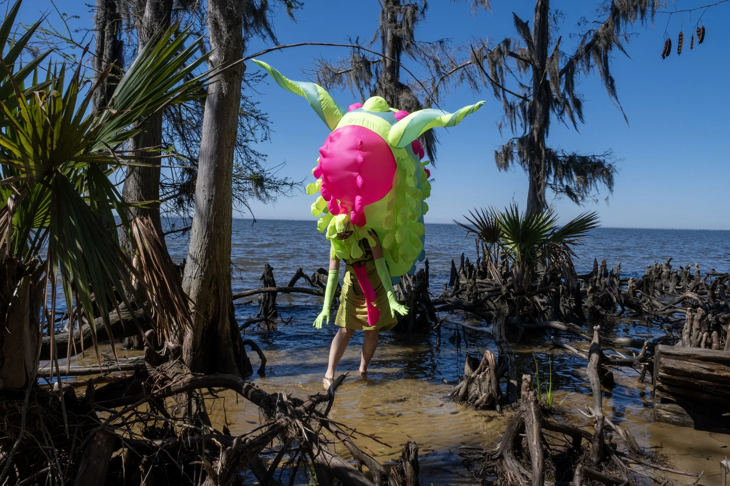 Inflatable sea slug by Nicole Banowetz in New Orleans swamp