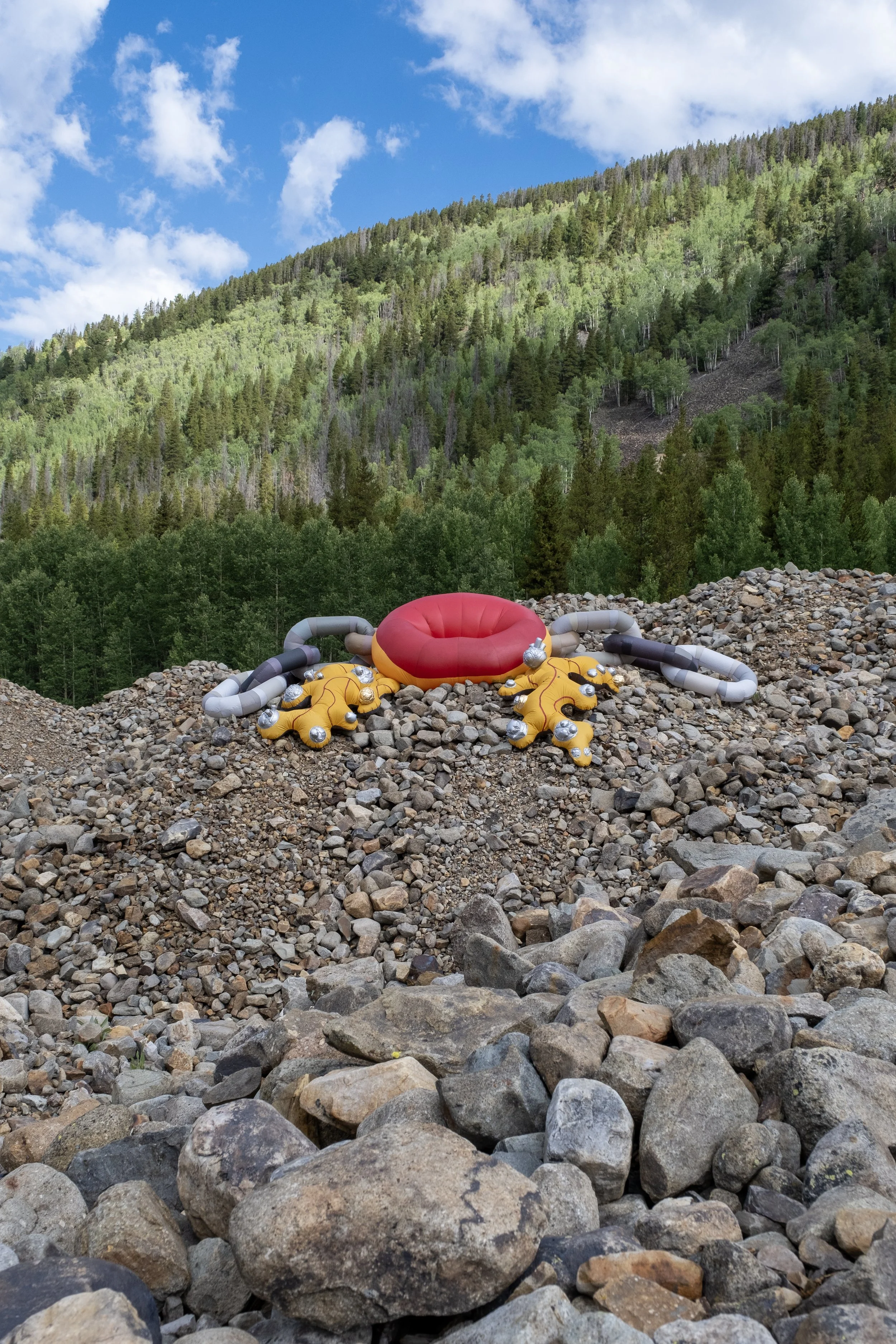 The Dredge inflatable performance sculpture in tailings piles in Breckenridge