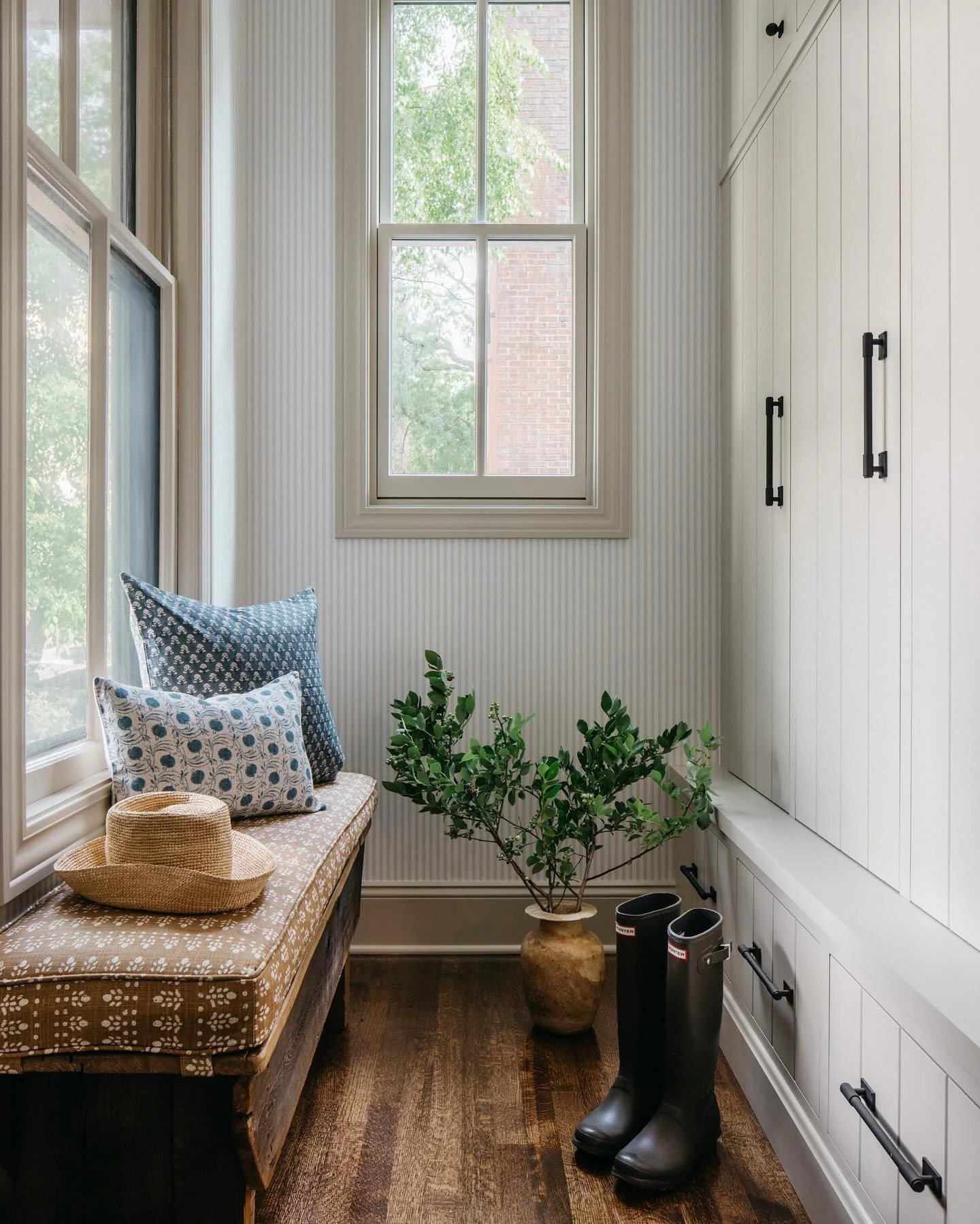 We loved being able to sneak a mudroom into the back entrance of this home. Formerly the kitchen dining area and now the perfect little nook for coats and shoes… and I’ve also been told a sneaky hiding place for our client’s kiddo
