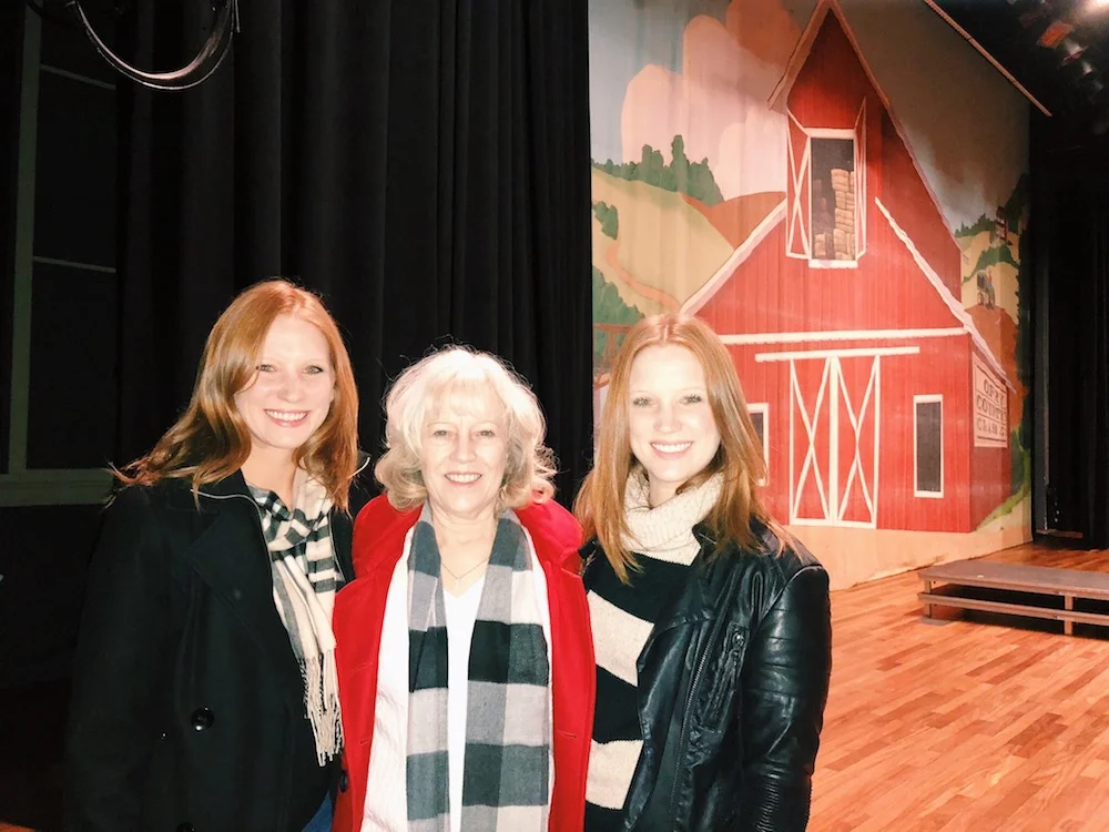 Ryman stage with twins and mother