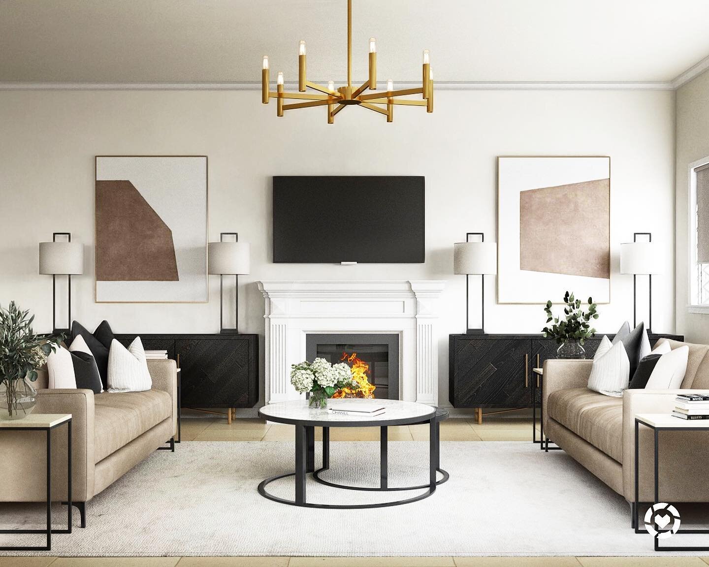 This living room is a symmetry lover&rsquo;s dream 😍 If you need to dress up a large wall, we love adding a grand electric fireplace (if a real one isn&rsquo;t possible!) flanked by two sideboards/buffets with large statement art 🖤 This was one of 