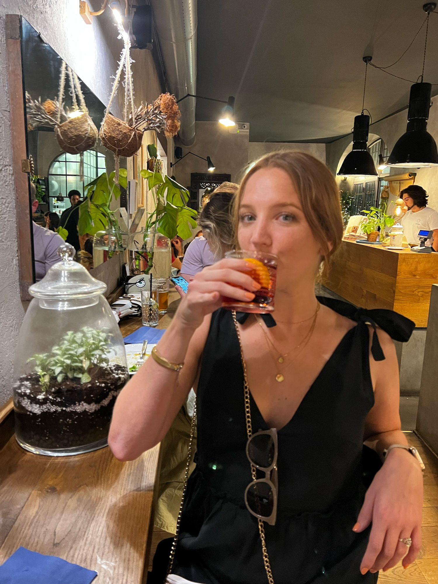 woman drinking negroni at Babae Firenze in florence, italy