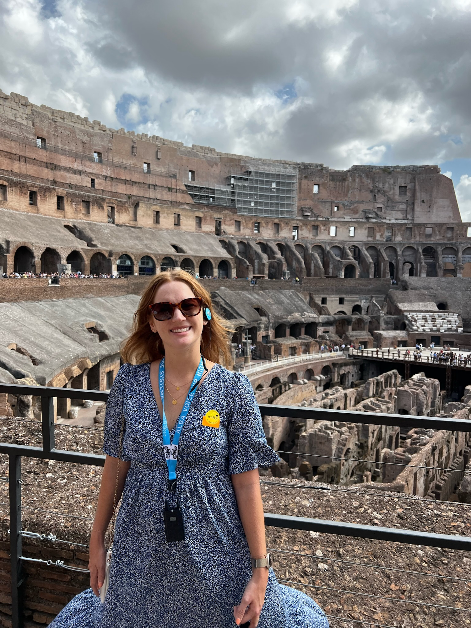 woman-smiling-with-headset-colosseum-tour-in-rome-italy