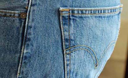 Too tight: Months of training have rendered my beloved Levi's 501s obsolete as they no longer accommodate my expanding derriere.