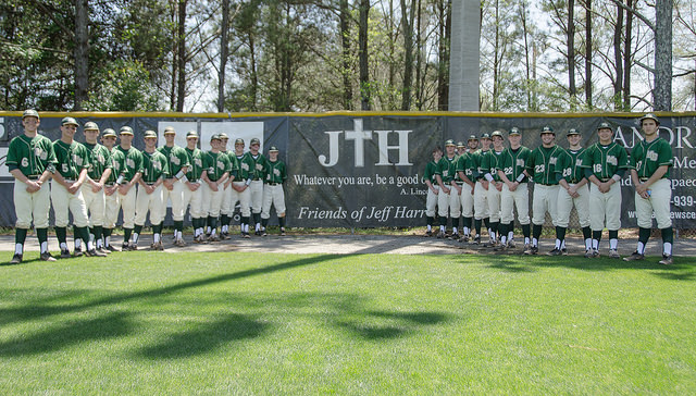 This awesome 2015 photo of the varsity baseball team includes two of my boys standing in front of a sign honoring their dad. His favorite thing to say was, "Whatever you are, be a good one." Many thanks to Ben Breland for the photography.