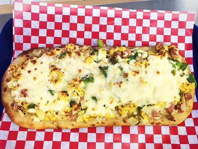 Did you get to try our special Breakfast Flatbread on Saturday? Let us know how you liked it, we just might bring it back another time!

Topped with scrambled eggs, ham, green peppers, onion, and mozzarella!