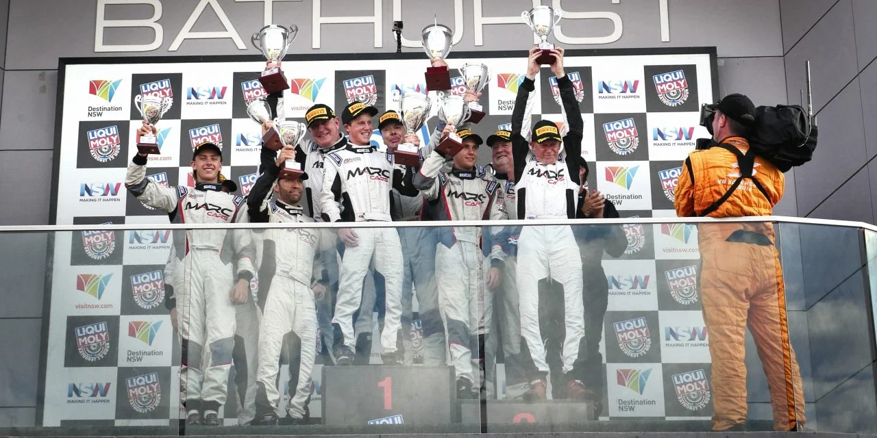 Will Brown is seen on the podium after claiming victory in lass in the 2017 Bathurst 12 HR race