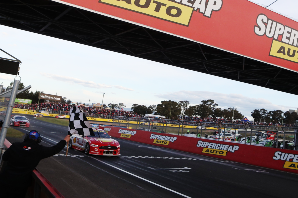 Scott McLaughlin takes the chequered flag at Bathurst - pic via: Speedcafe