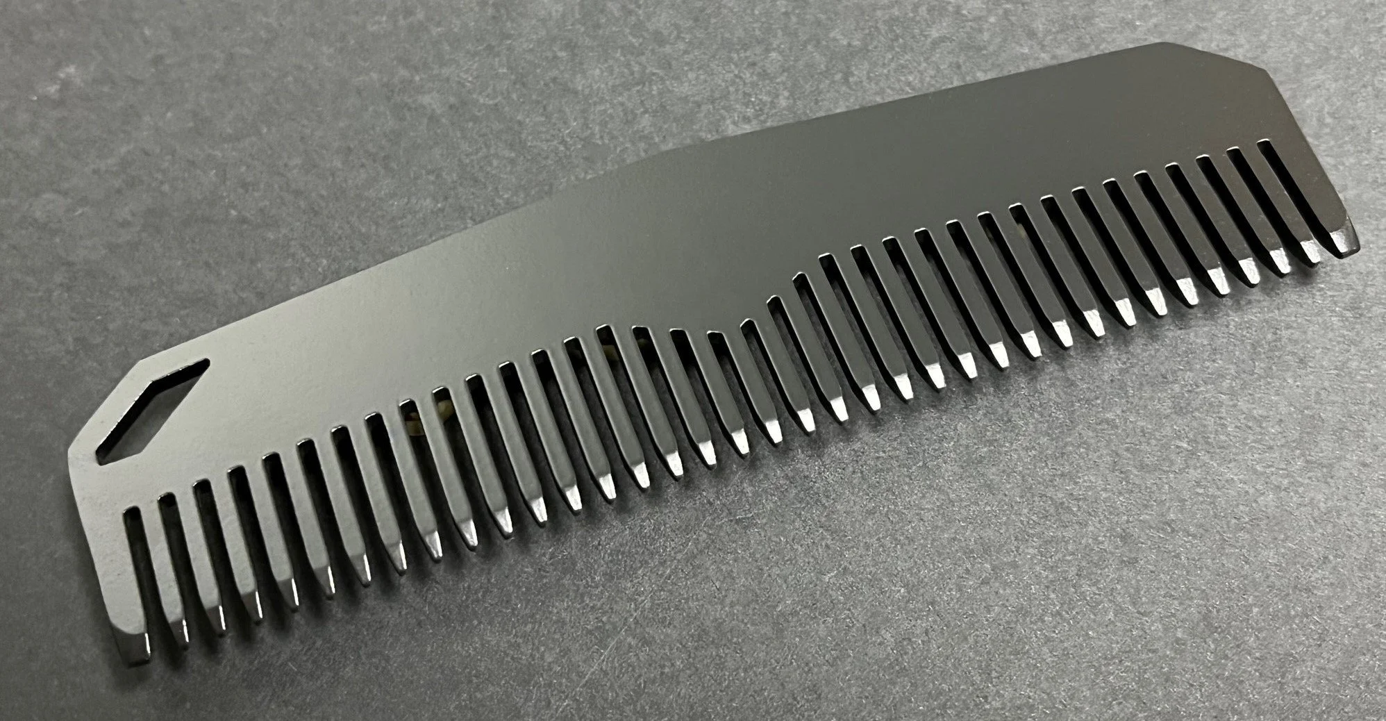 Aero Comb titanium pocket comb — Metal Comb Works