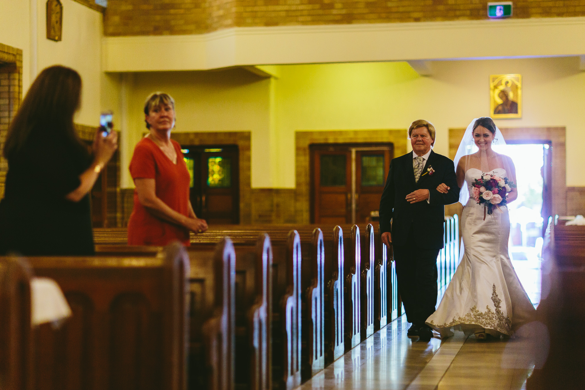 Bride Walking Down Aisle in St Christopher's Cathedral