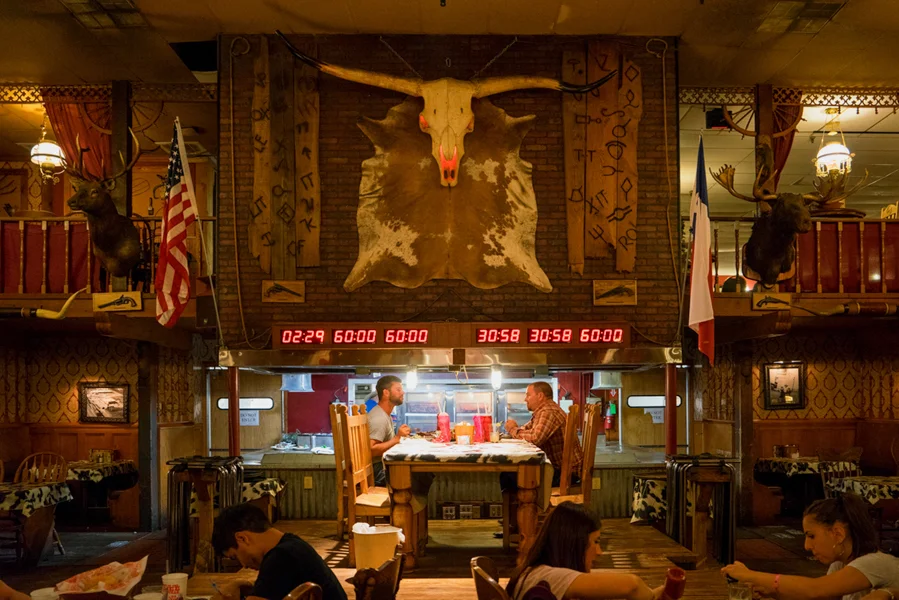 The Big Texan, Amarillo, TX Being fans of food and the overindulgent adventures of Man vs. Food, we were more than excited for a meal at the Big Texan. This roadside attraction is famed for their "72oz Steak Challenge". The challenge is basically an impossible feat where a contestant has one hour to eat a 72oz steak, a baked potato, a bread roll, and a salad. Eat it all and it's free, fail miserably and you have quite the bill to pay. We stuck to something a little more manageable, although Jenny did contemplate attempting the challenge in the midst of her hunger. We were lucky enough to watch two men attempt the challenge and fail.