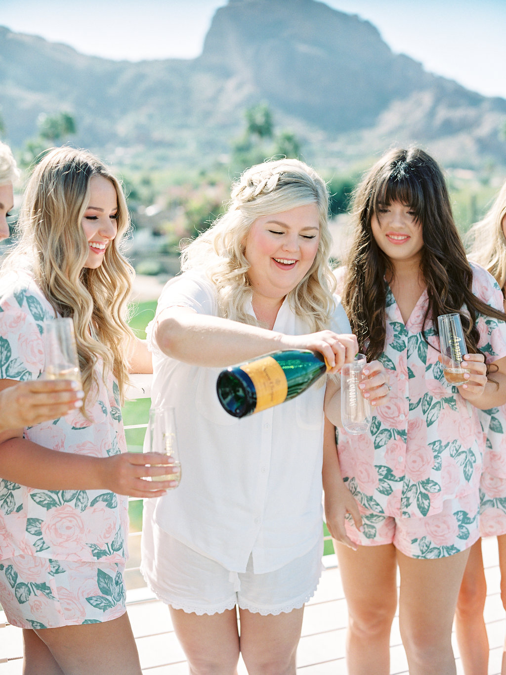 bride pouring champagne.jpg