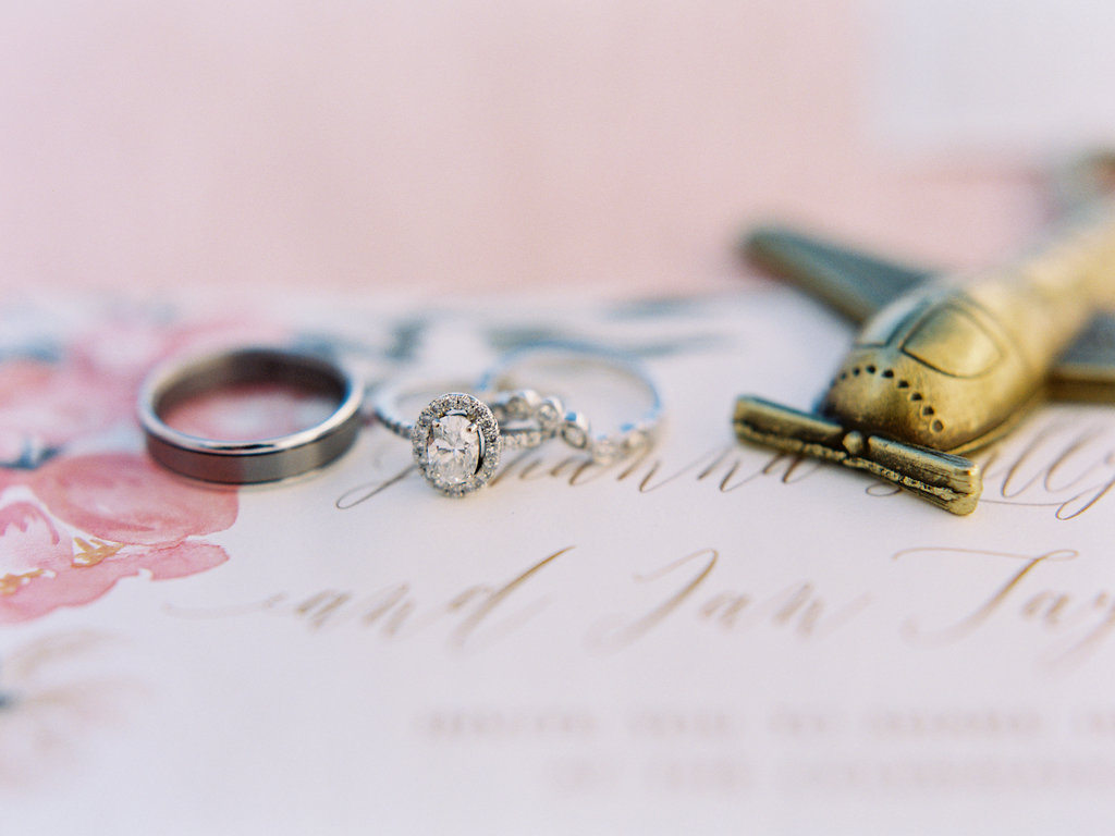 Wedding rings with airplane.jpg
