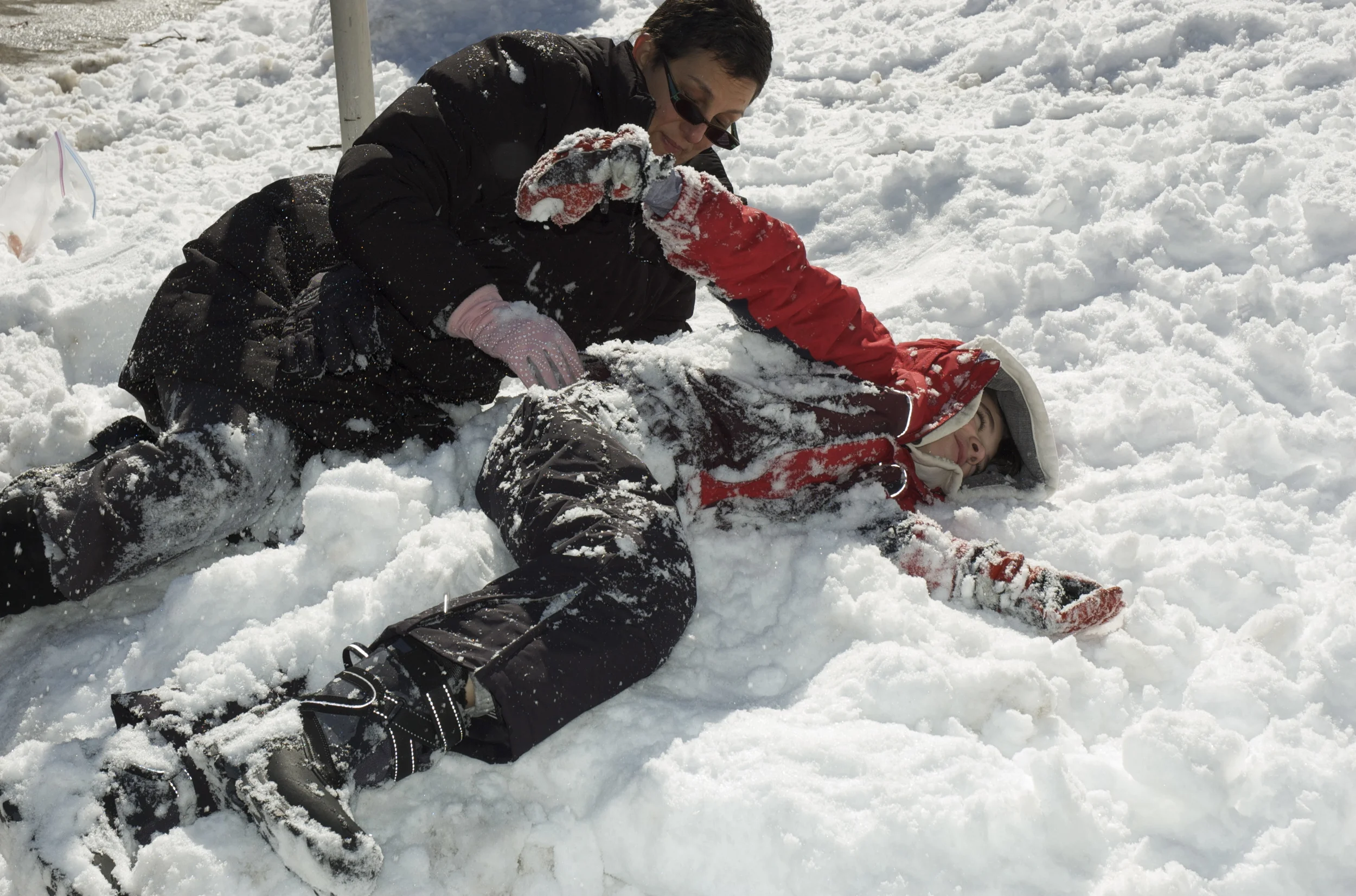 Me and our godchild, Premier Luca playing in the snow.