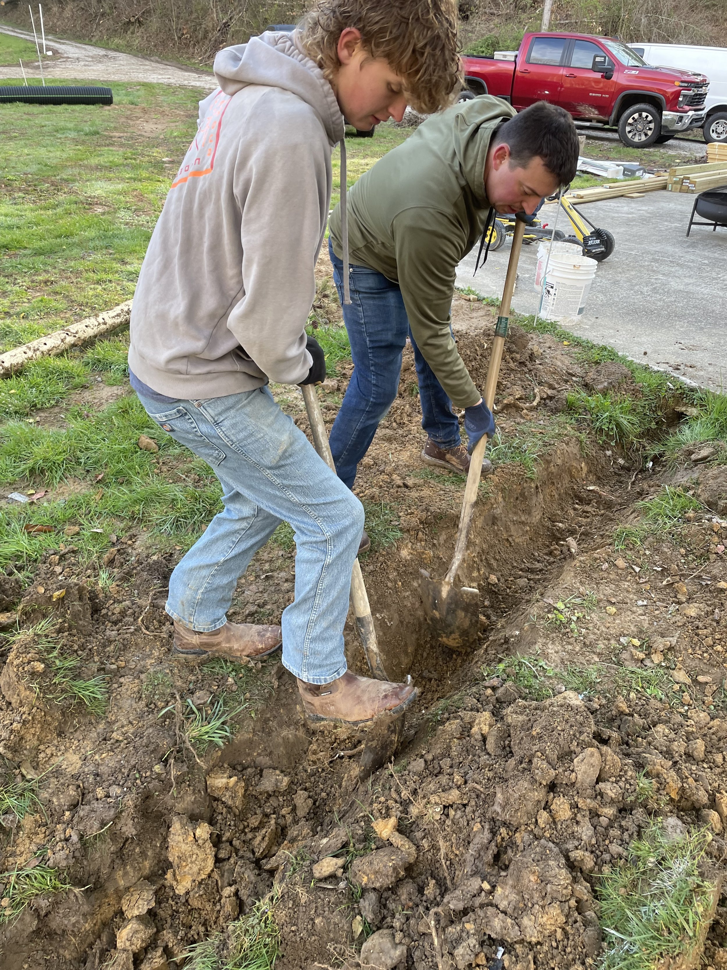 youth-group-digging-trench-shovel-camp-nathaniel.jpg