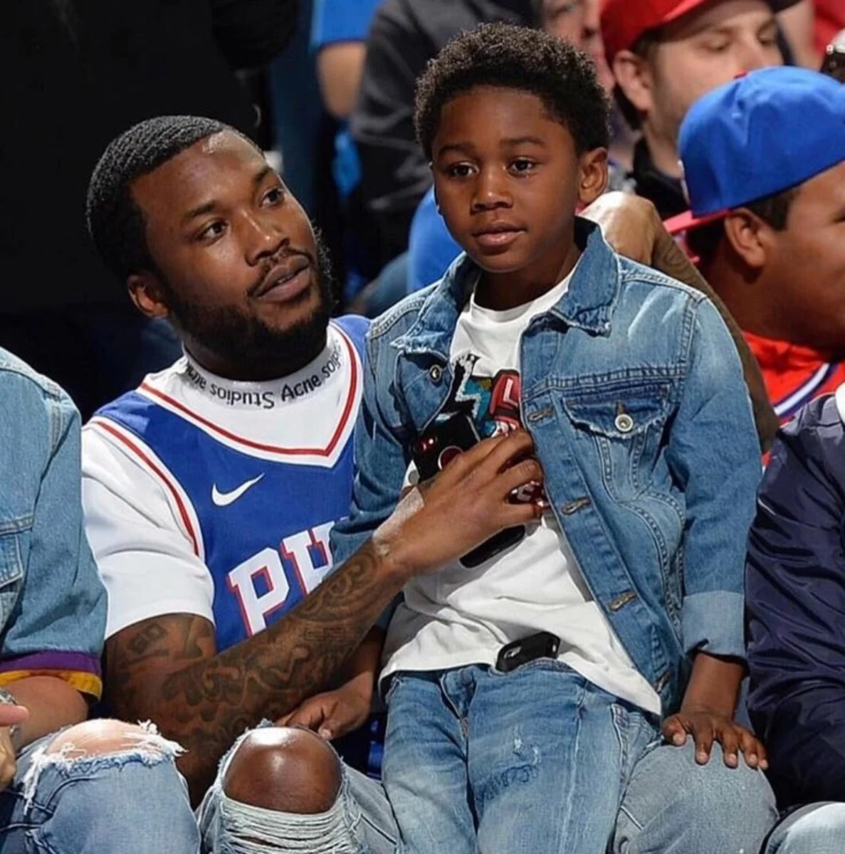 Meek and Son Catch a 76ers game after being release from Prison