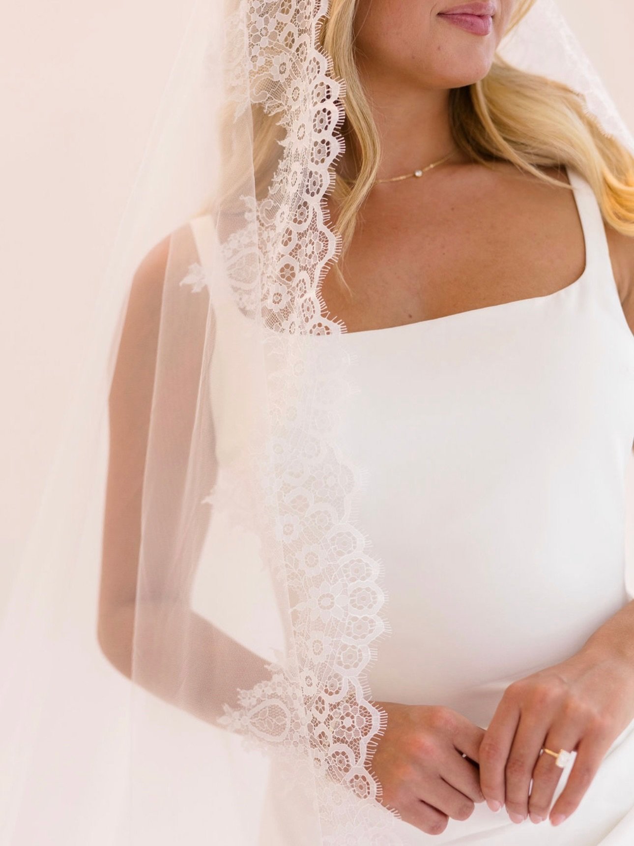 Always in full support of pairing a clean gown with a touch of lace, and this @mwlbride gown + @essenseofaustralia veil combo has our hearts 🫶

Photos by @meghanpremuda 

#houseofwhitebridal #lacebridalveil #mwlbride 

House of White is an intimate 