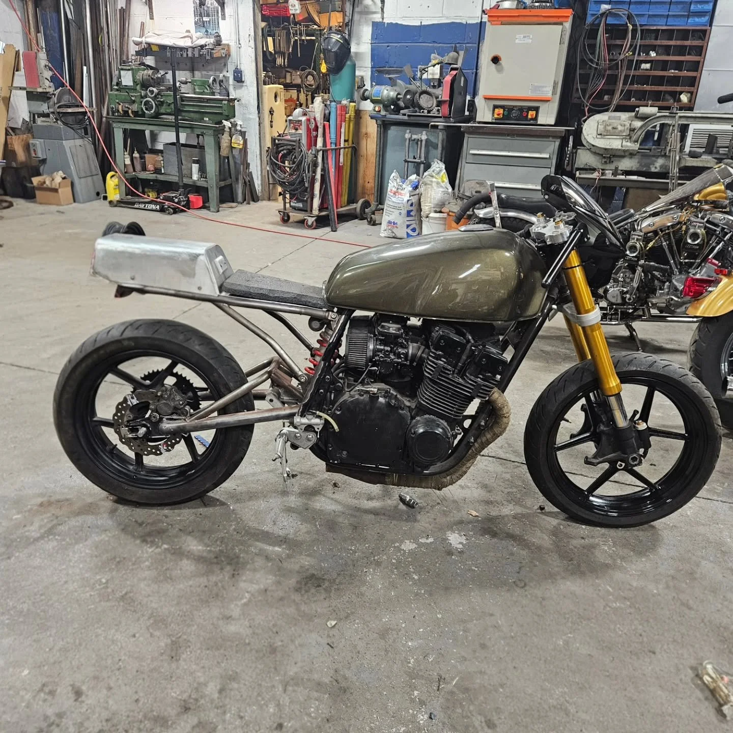 Look simple but if you have ever worked with a GS750 you know how extremely limited you are with chain clearance due to the narrow frame. Here we manage to settle on a set of Versys 650 mags by modifying the sprocket drive hub giving us the clearance