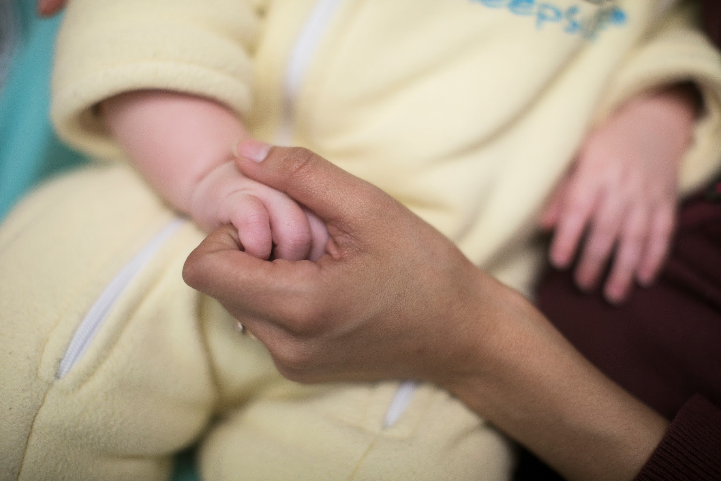 holding baby hand.jpg