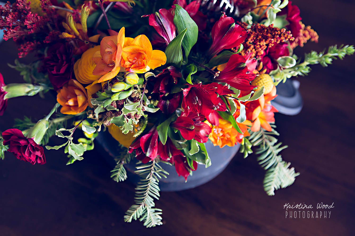 flower arrangement in teapot