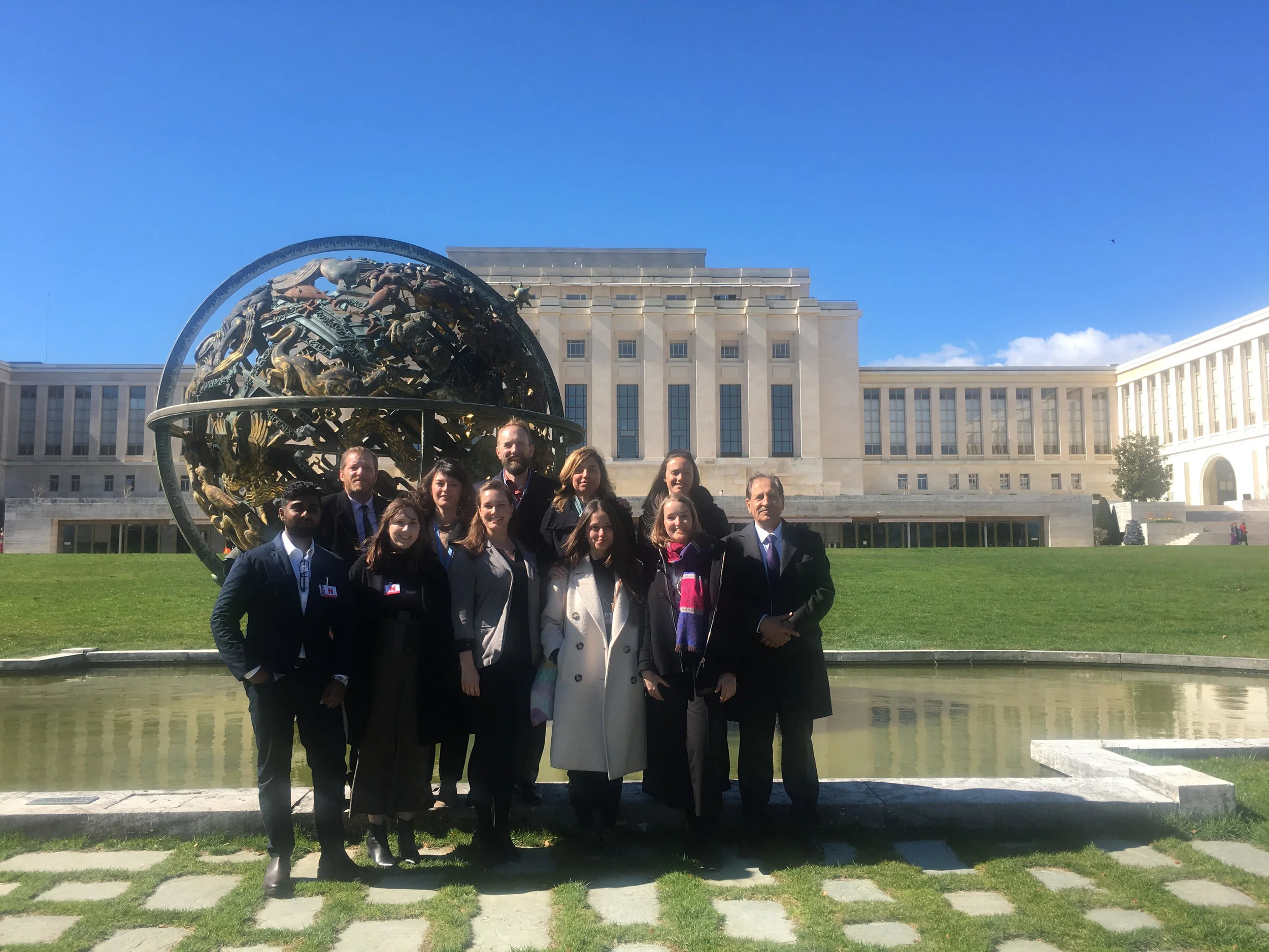Previous participants in front of the Palais des Nations at the 40th Session of the Human Rights Council.