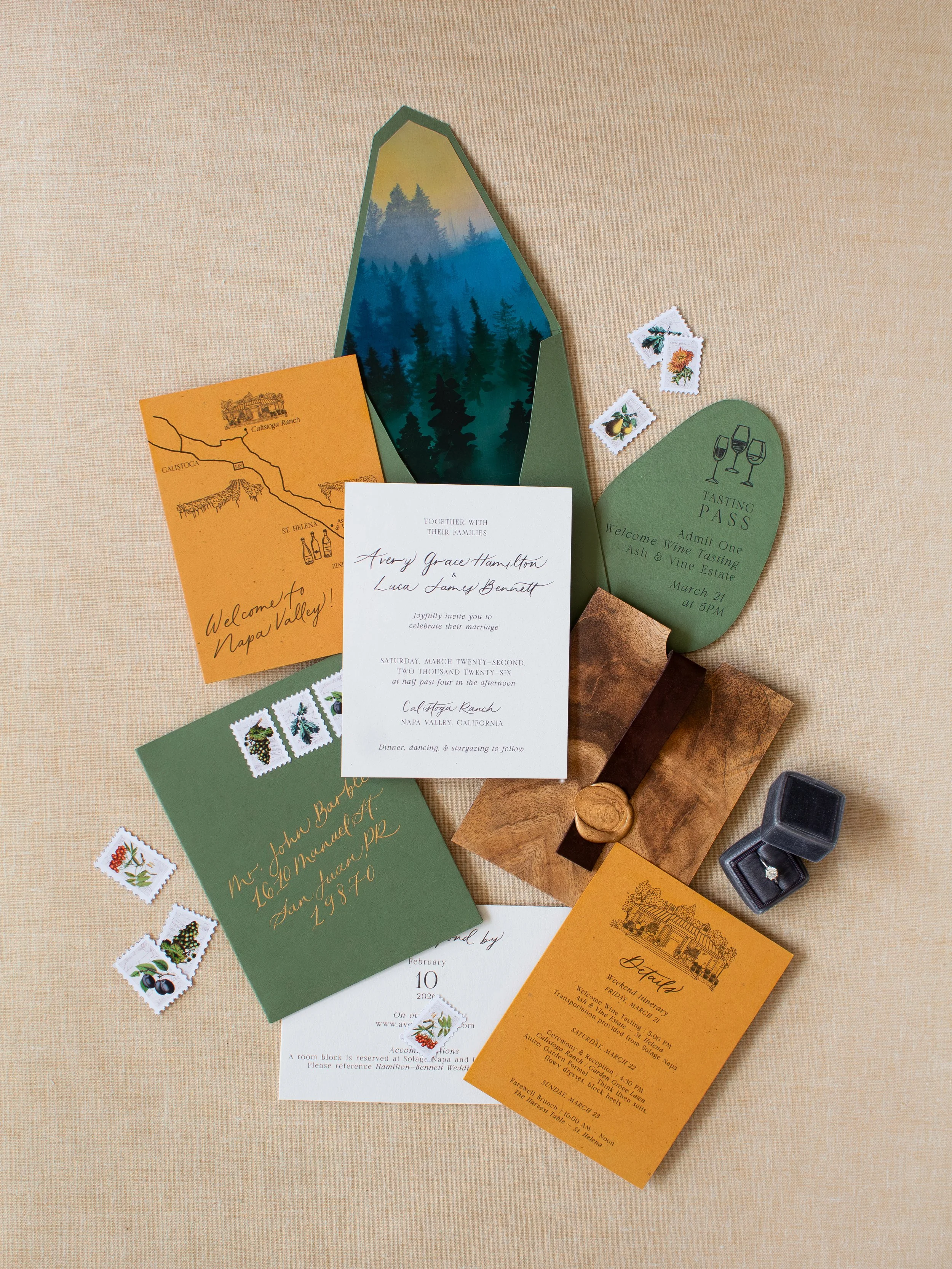 Napa Valley luxury custom invitation suite, custom map, wood texture pocket, wax seal, hand painted envelope liner of mountains, wine tasting pass