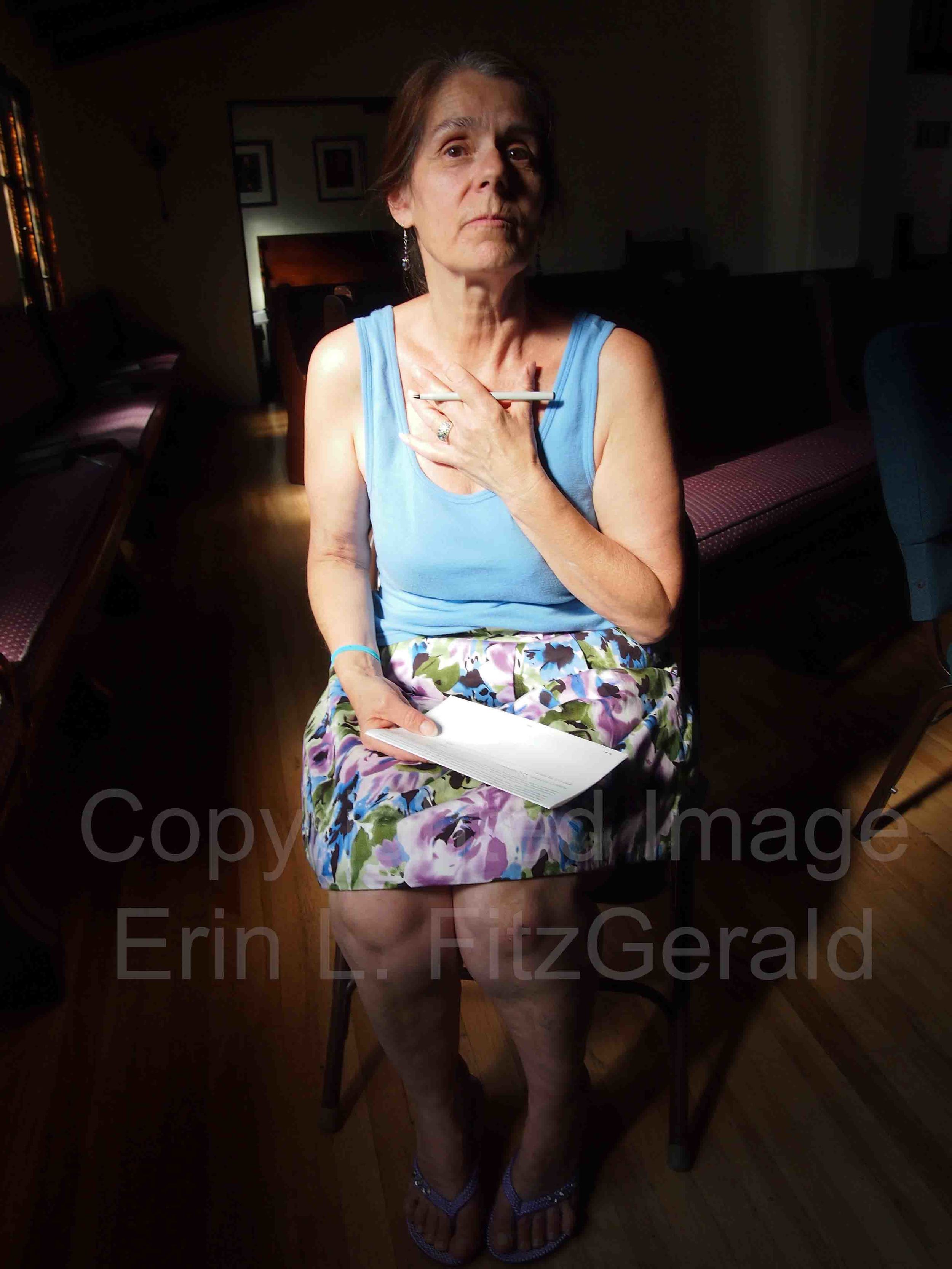   An under-insured woman in Santa Monica expresses concern about the future after a healthcare screening held during CNA's Medicare-for-All bus tour.  