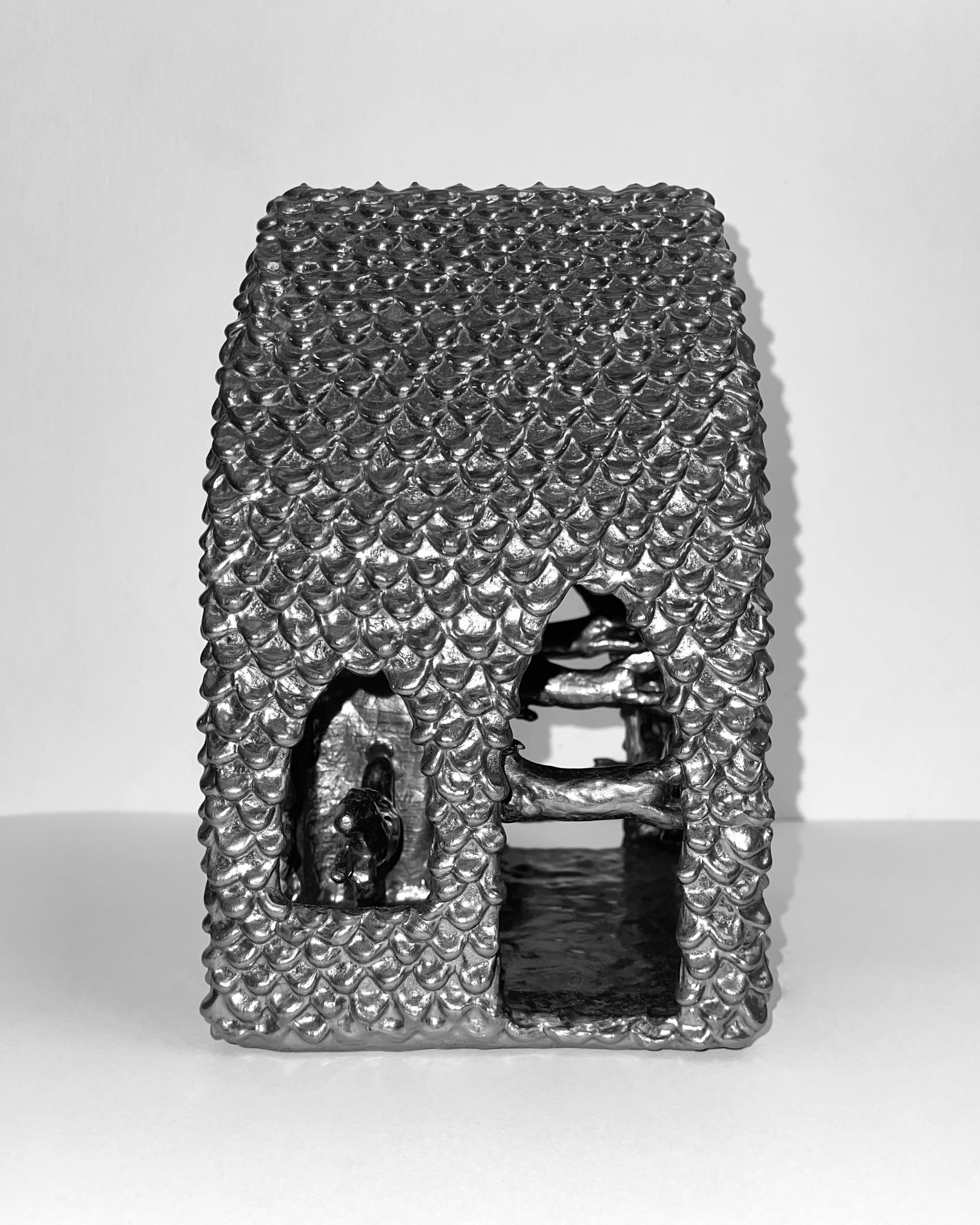   time flies (pony church III) -  view 5    graphite over clay. 9×7×6. 2024 