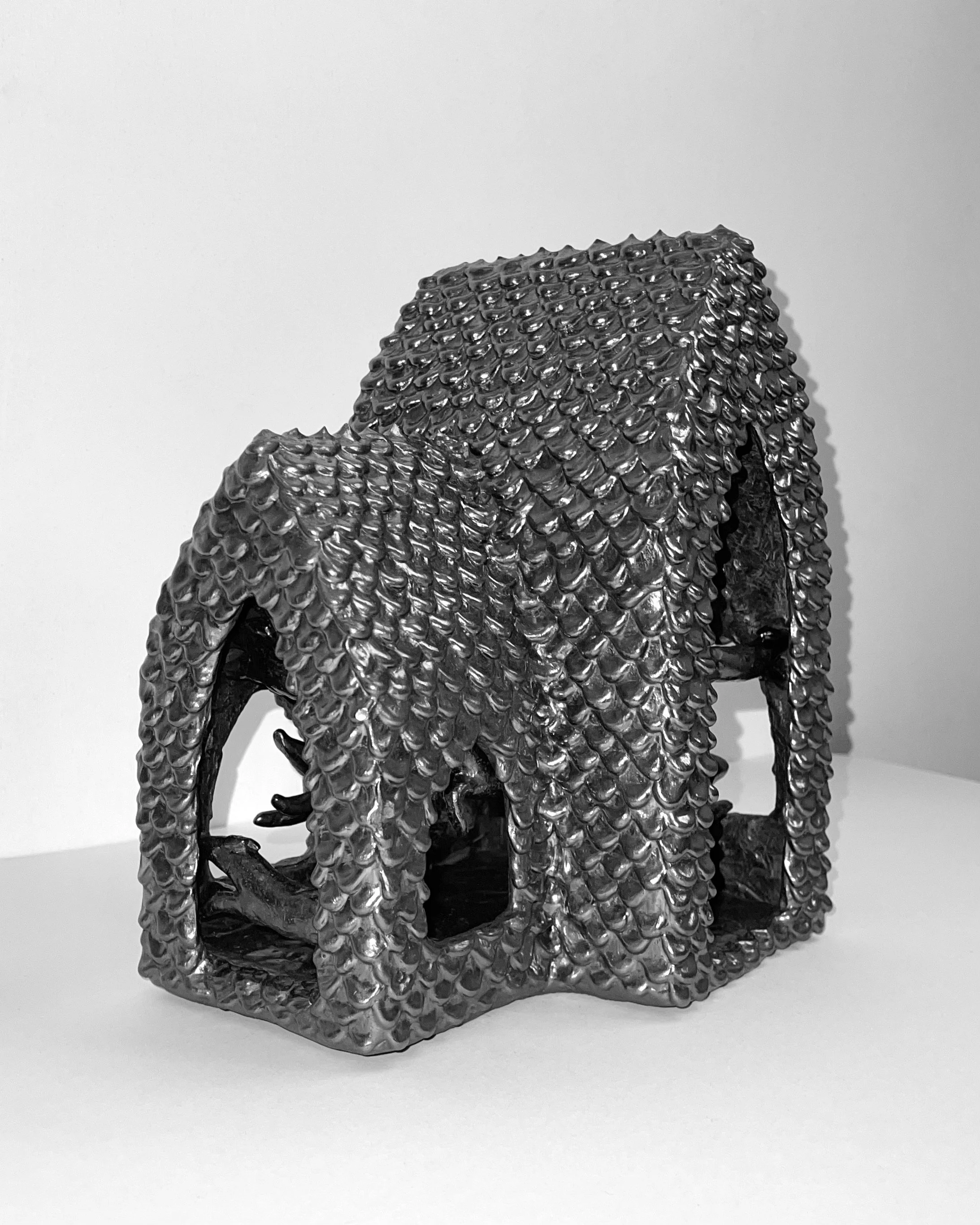   time flies (pony church III) -  view 1    graphite over clay. 9×7×6. 2024 