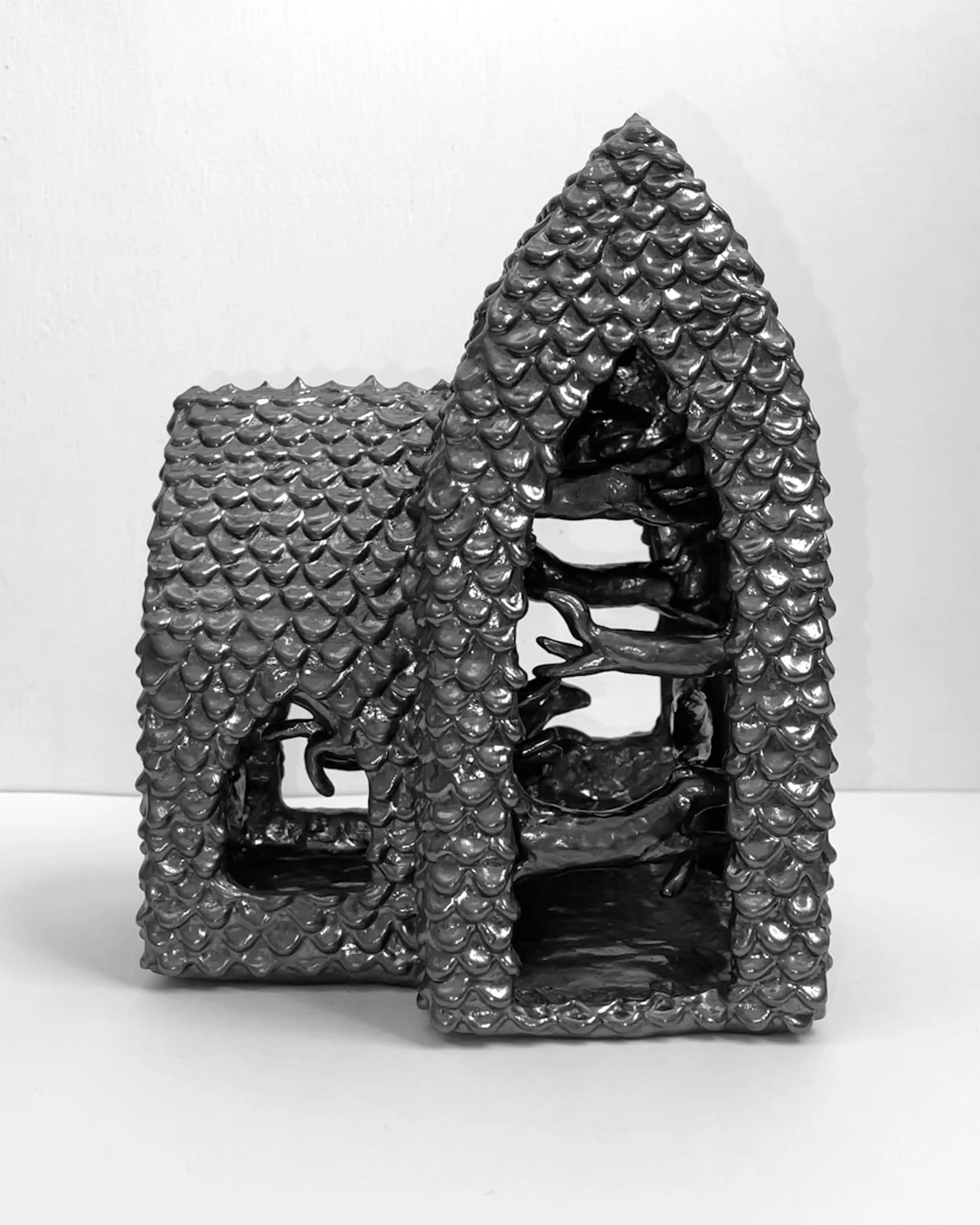   time flies (pony church III) -  view 2    graphite over clay. 9×7×6. 2024 