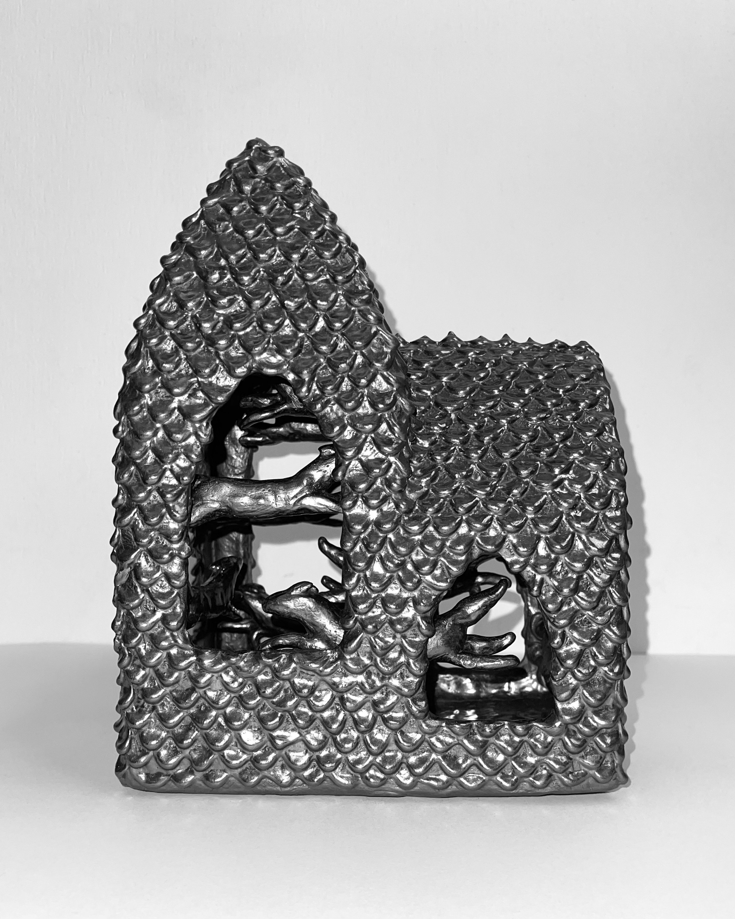   time flies (pony church III) -  view 3    graphite over clay. 9×7×6. 2024 