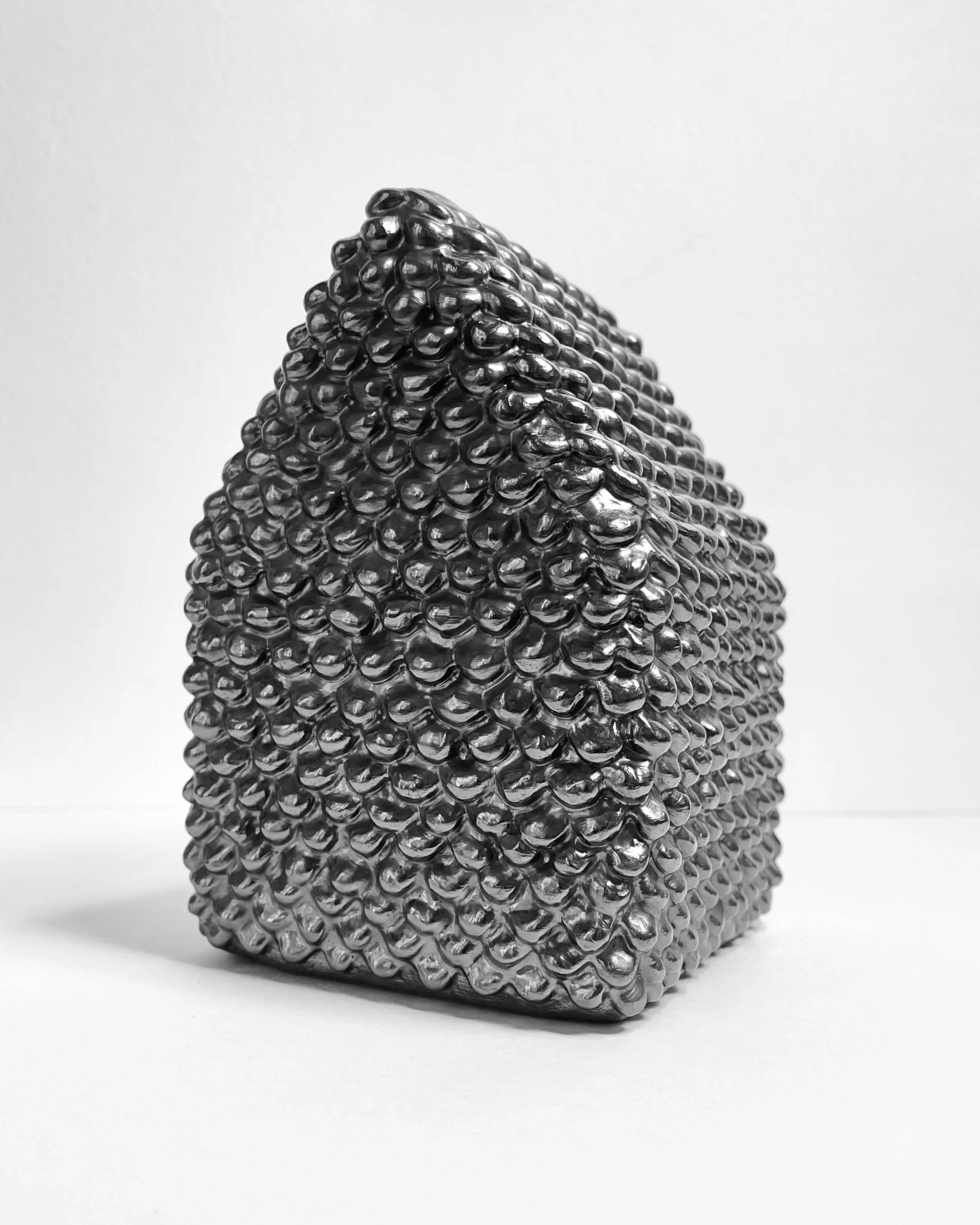   time flies -  view 2    graphite over clay. 7.5×4.5×4.5. 2025 