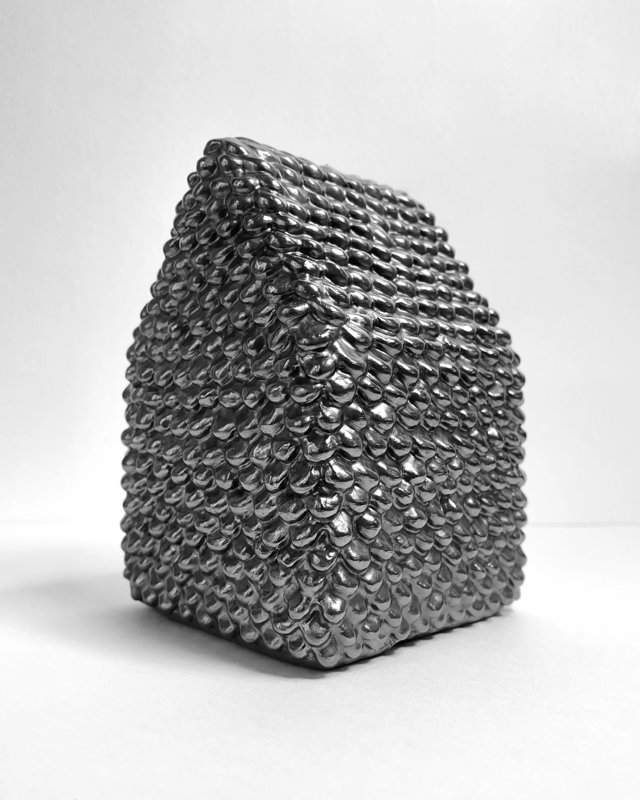   time flies -  view 3    graphite over clay. 7.5×4.5×4.5. 2025 