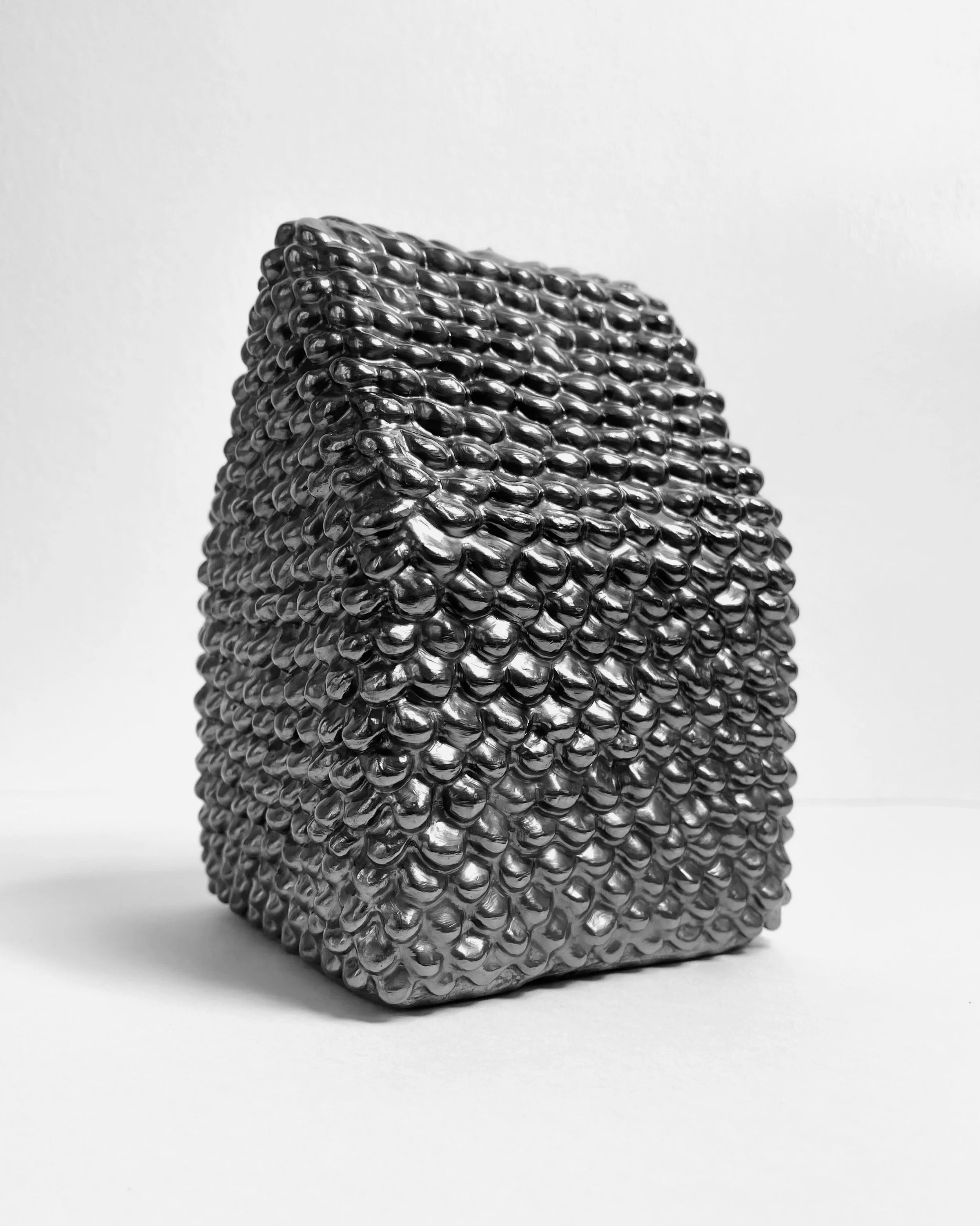   time flies -  view 4    graphite over clay. 7.5×4.5×4.5. 2025 