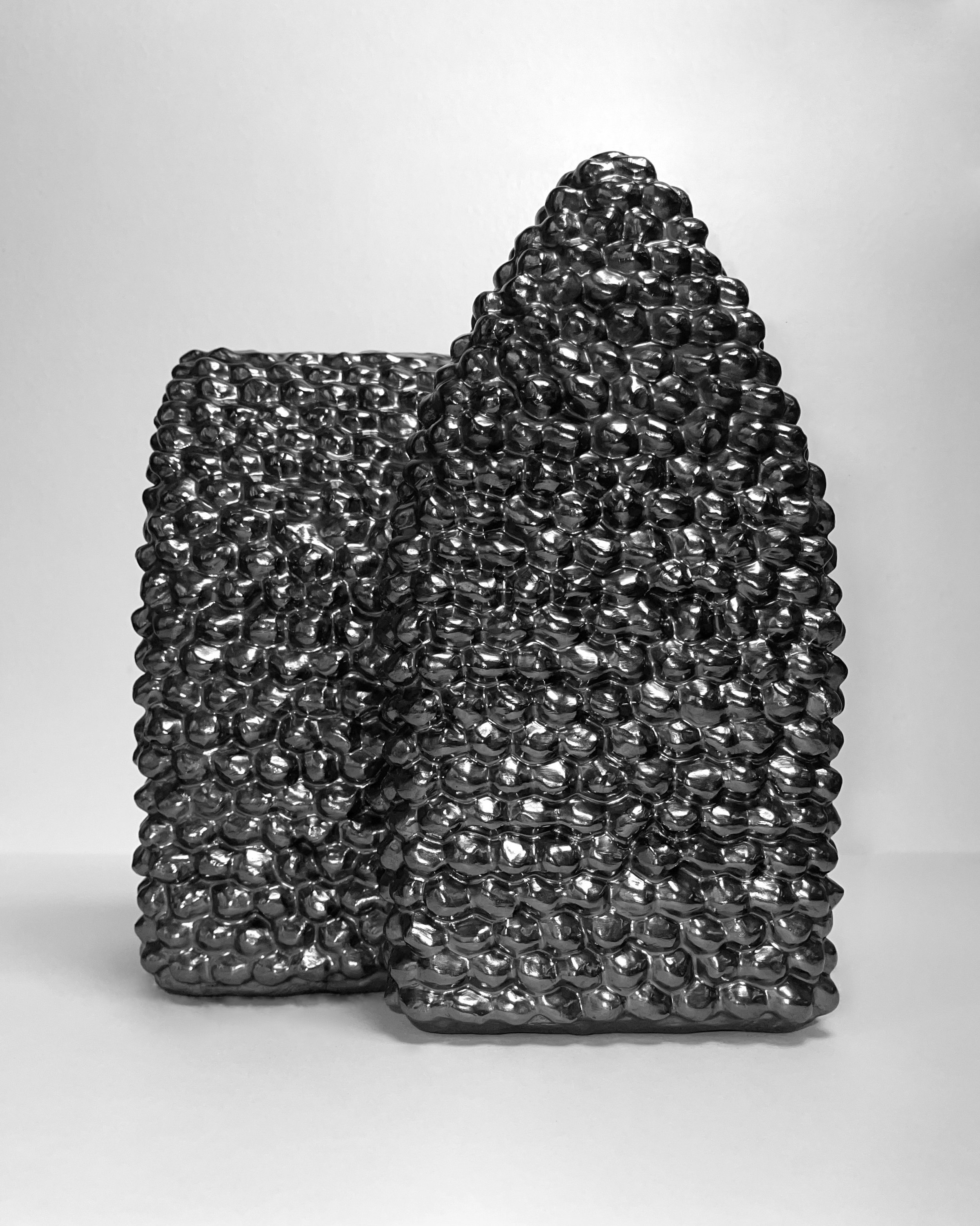   come home -  view 1    graphite over clay. 9.5×8×7. 2025 