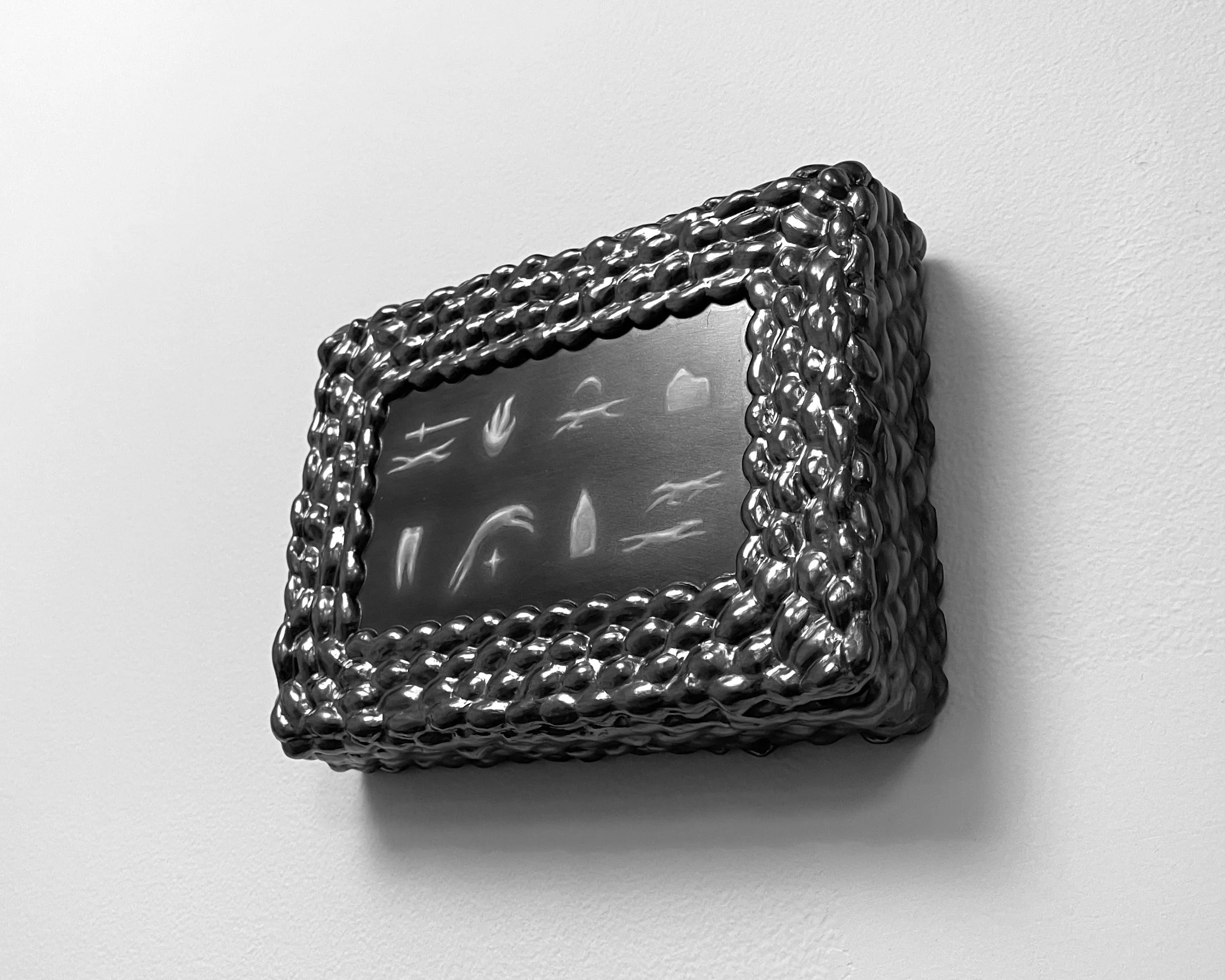   an attempt at order -  view 3    graphite on panel with graphite frame. 5.5×7.5×1.75. 2025 