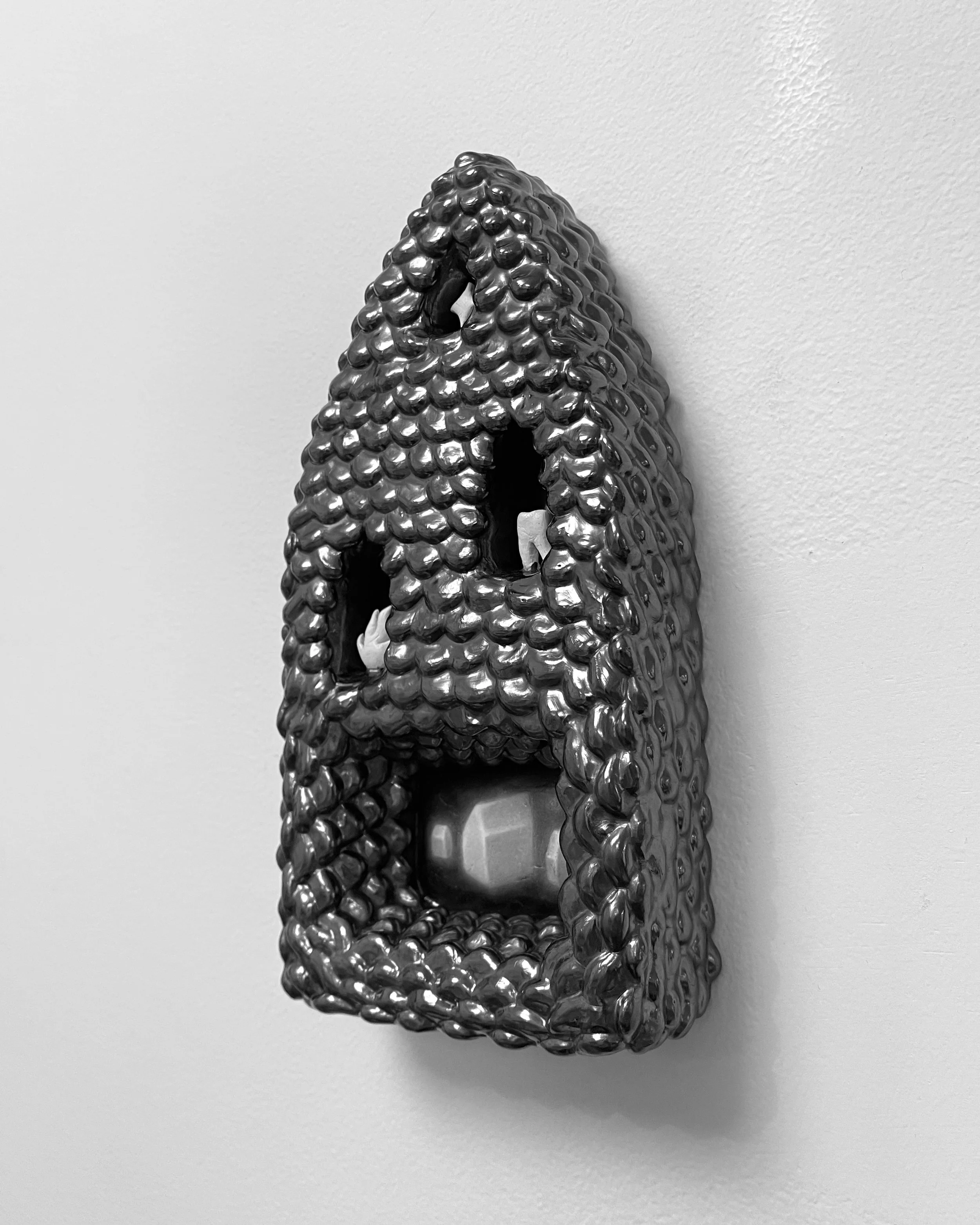   a second attempt at order -  view 2    graphite on panel with graphite frame. 9×4.75×1.75. 2025 