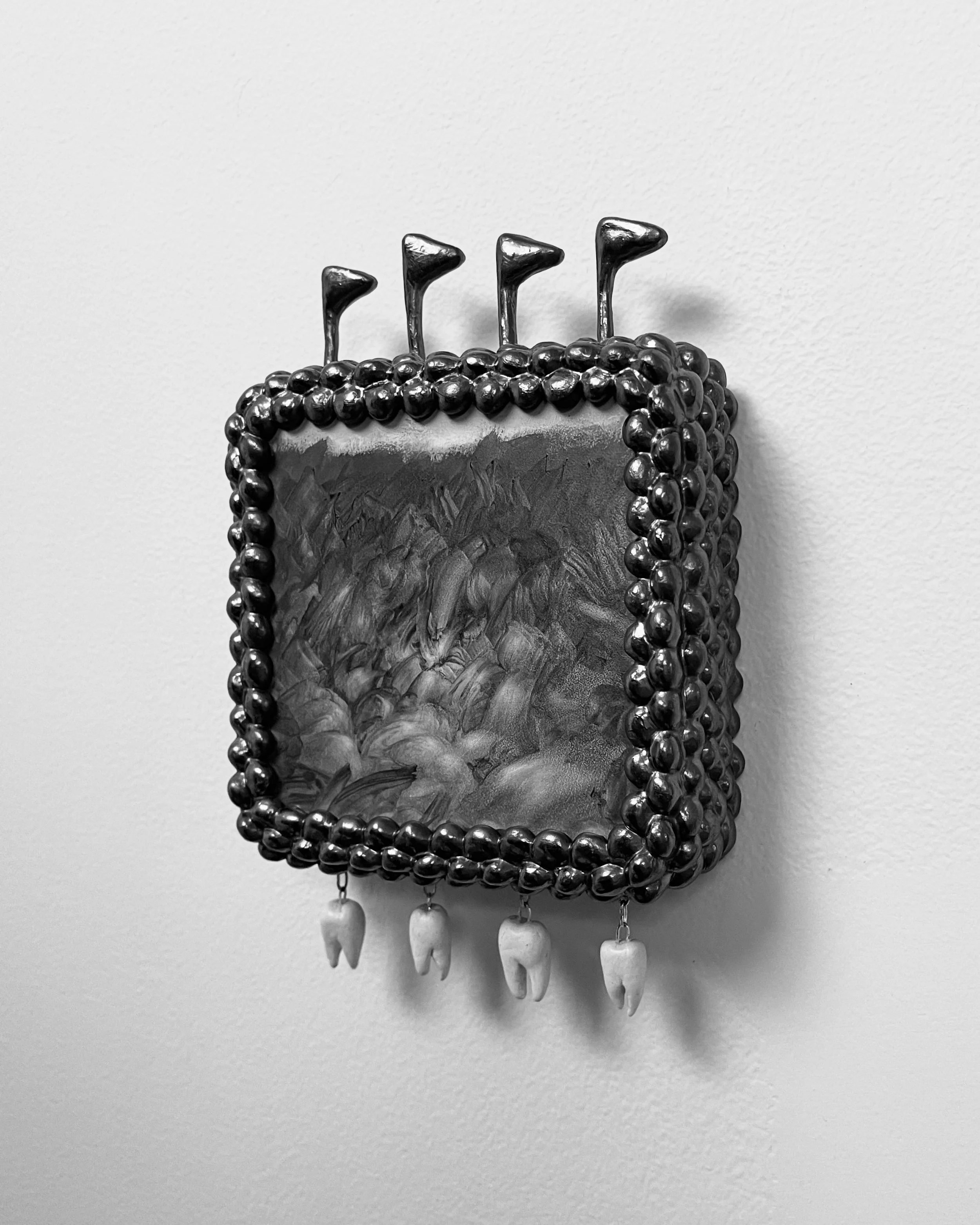  real/real -  view 2    graphite on panel with graphite frame, clay, wire. 7×5. 2026 