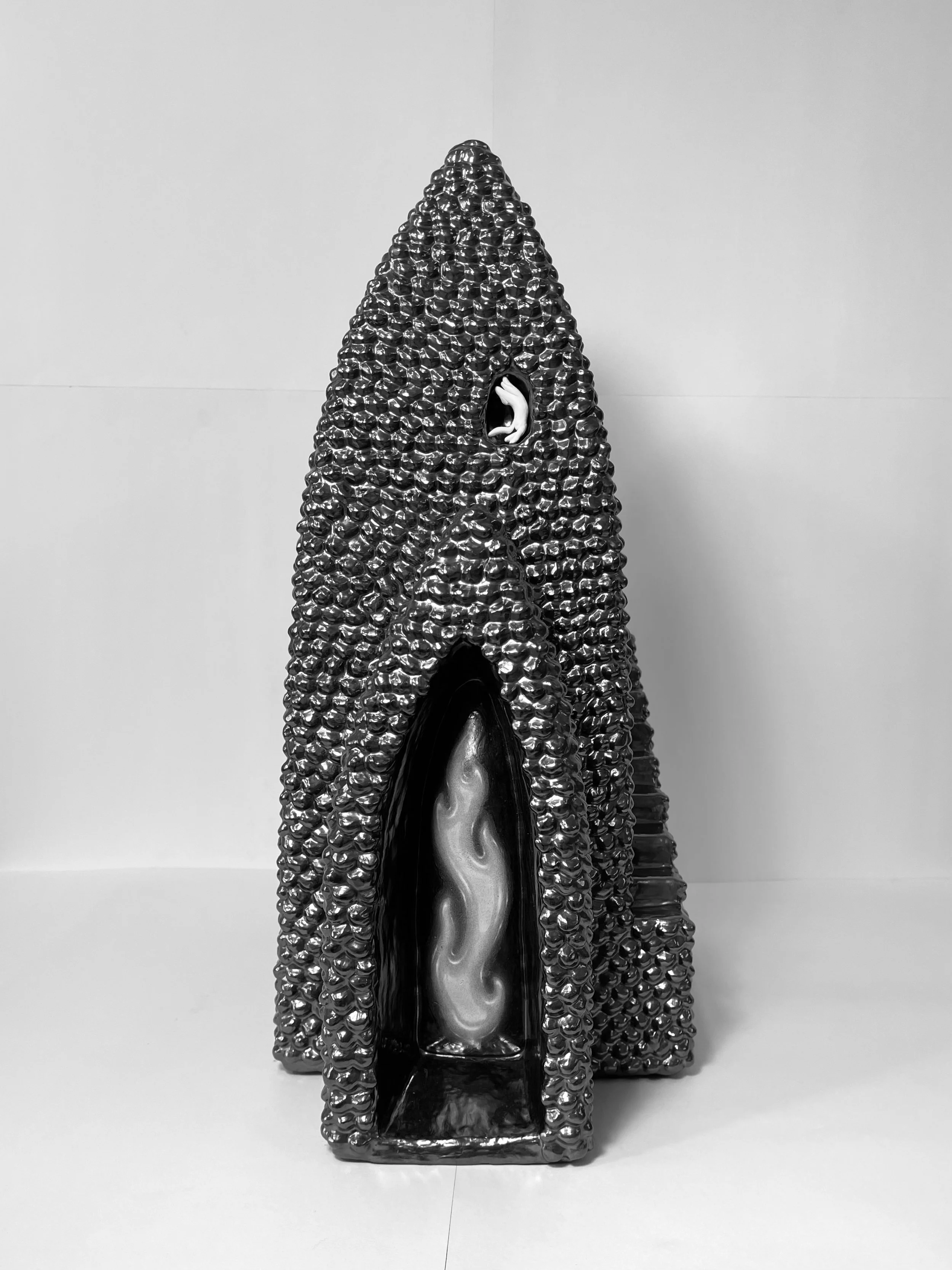   unearth -  view 1    graphite over clay, clay. 20.5x9.25x15. 2026 