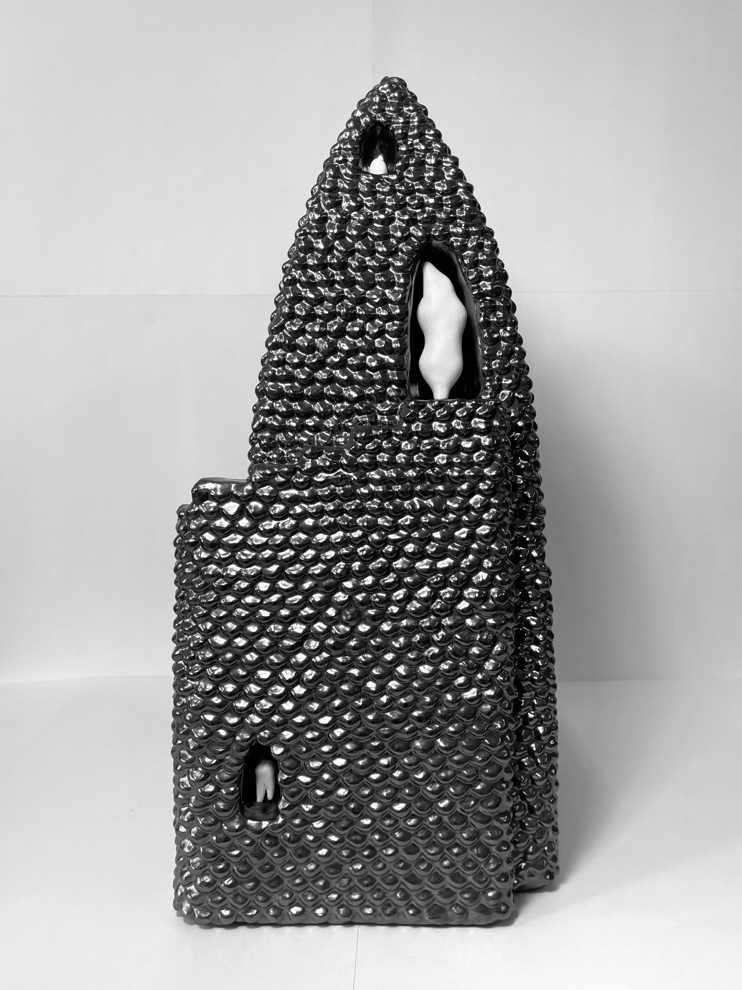   unearth -  view 3    graphite over clay, clay. 20.5x9.25x15. 2026 