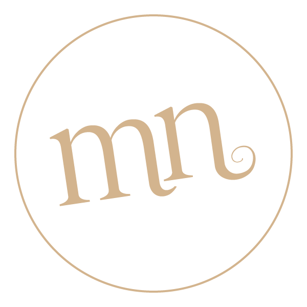 A black circular logo with beige border and beige lowercase 'mn' in the center.