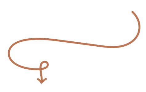 A simple, hand-drawn arrow with a curved tail pointing downward.