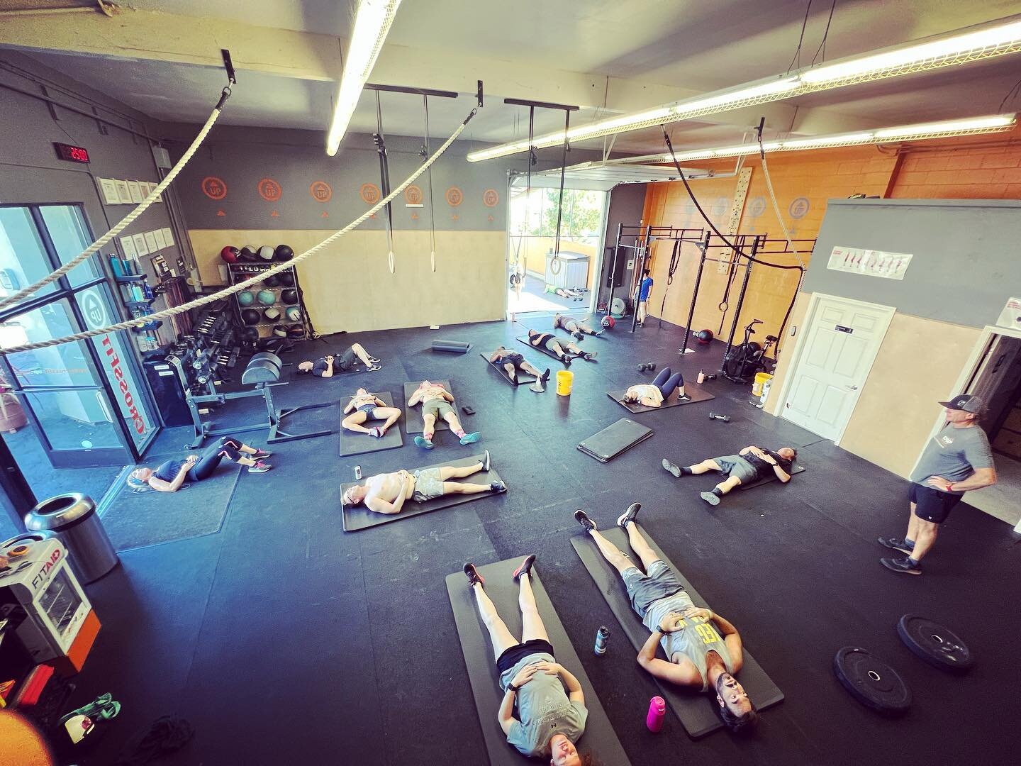 How do you recover after a grueling WOD?

Coach Tim took the 4:15 through a post-WOD recovery breathing session after spending 20-ish minutes in a high heart rate state.

Getting the body out of sympathetic(fight or flight) drive and back into a para