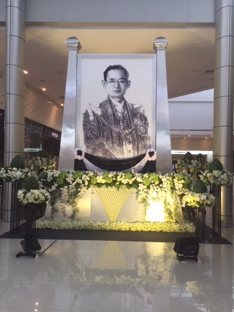 The whole city is filled with portraits of the King.