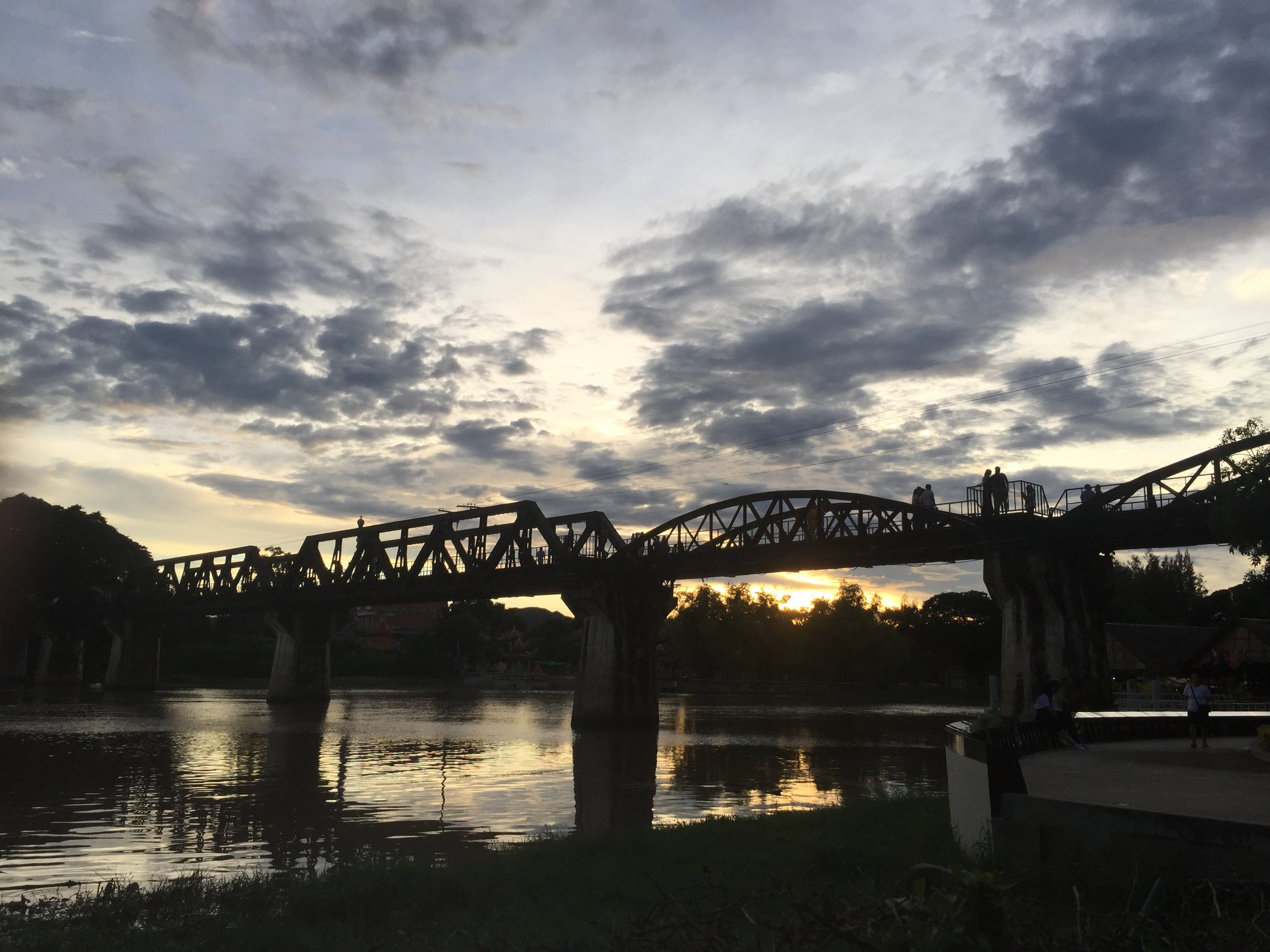 Sunset over the bridge over the River Kwai.